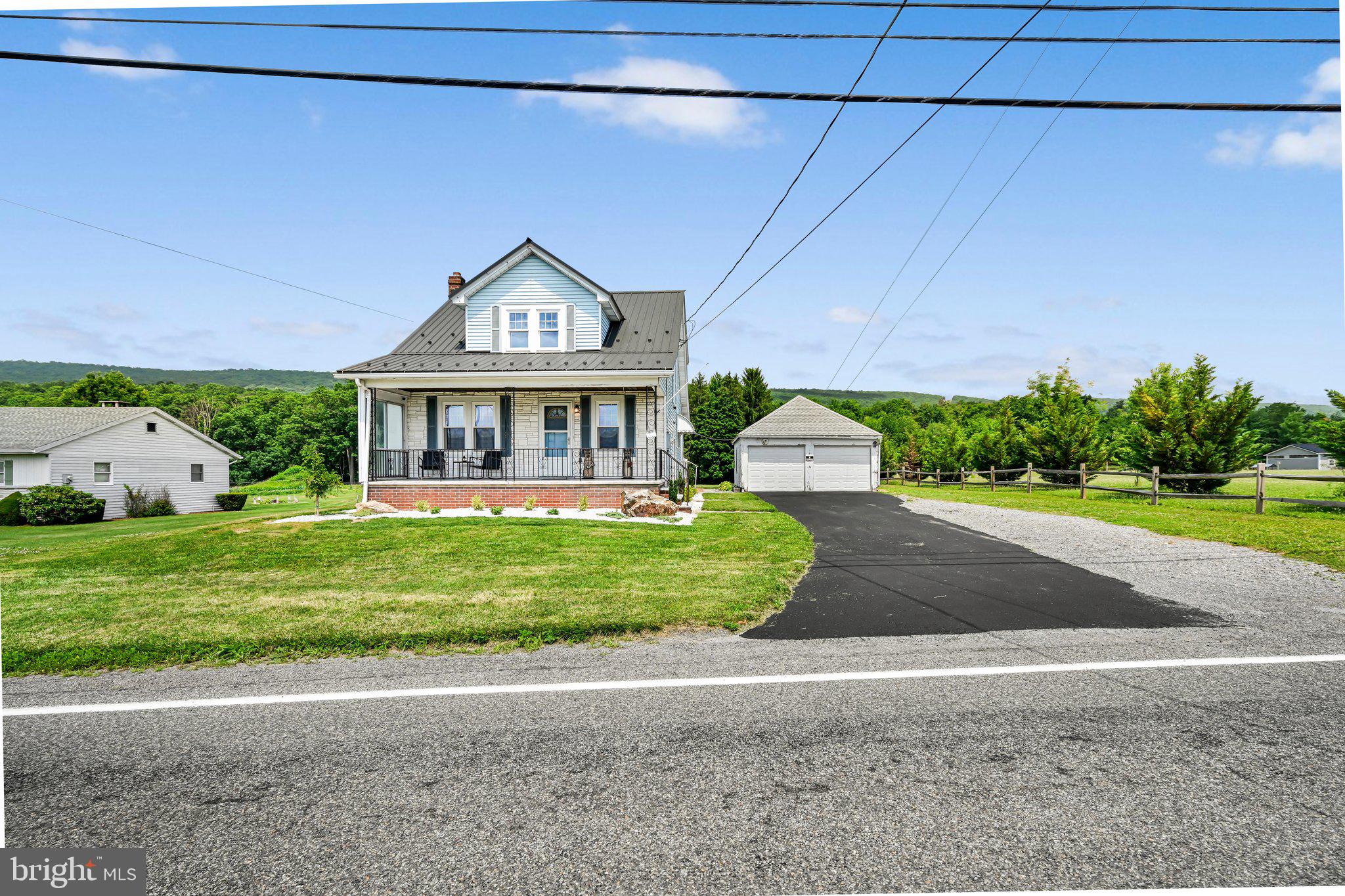Welcome home to peaceful country living! 

This charming 3-bedroom, 2 full-bath home sits on a beautiful 0.75-acre lot surrounded by scenic rural views. 

Step inside to the mudroom where radiant floor heat has been added for convenience to host a first-floor laundry set up.  A pantry storage area is big enough to obtain all of your goods. Stepping through a sliding glass door, a newly added Trex deck has been added to sit back and relax and take in all the tranquil country views, with your morning coffee.  

A spacious kitchen serves for all your preparation needs as well as eat in dining, or serve your guests in the next room that combines the dining room and living room.  An added pellet stove is just enough to take away the chill through the winter season.

Travel up the carpeted stairs where you will find 3 generous sized bedrooms, with plenty of closet space.  Additional storage can be found in the crawl spaces throughout the upstairs.  The home comes partially furnished with bedroom furniture too!  There is a full bath upstairs and downstairs.  

Additional updates include a brand-new metal roof (June 2026) and new flooring throughout the home offering long-lasting durability and peace of mind. The detached 2-car garage provides ample room for parking, storage, or a workshop.

If you're looking for the perfect blend of modern updates and quiet country charm, this move-in-ready home is one you won't want to miss!

Get your preapprovals ready and see us at our OPEN HOUSE July 6th 5:00-7:00pm
