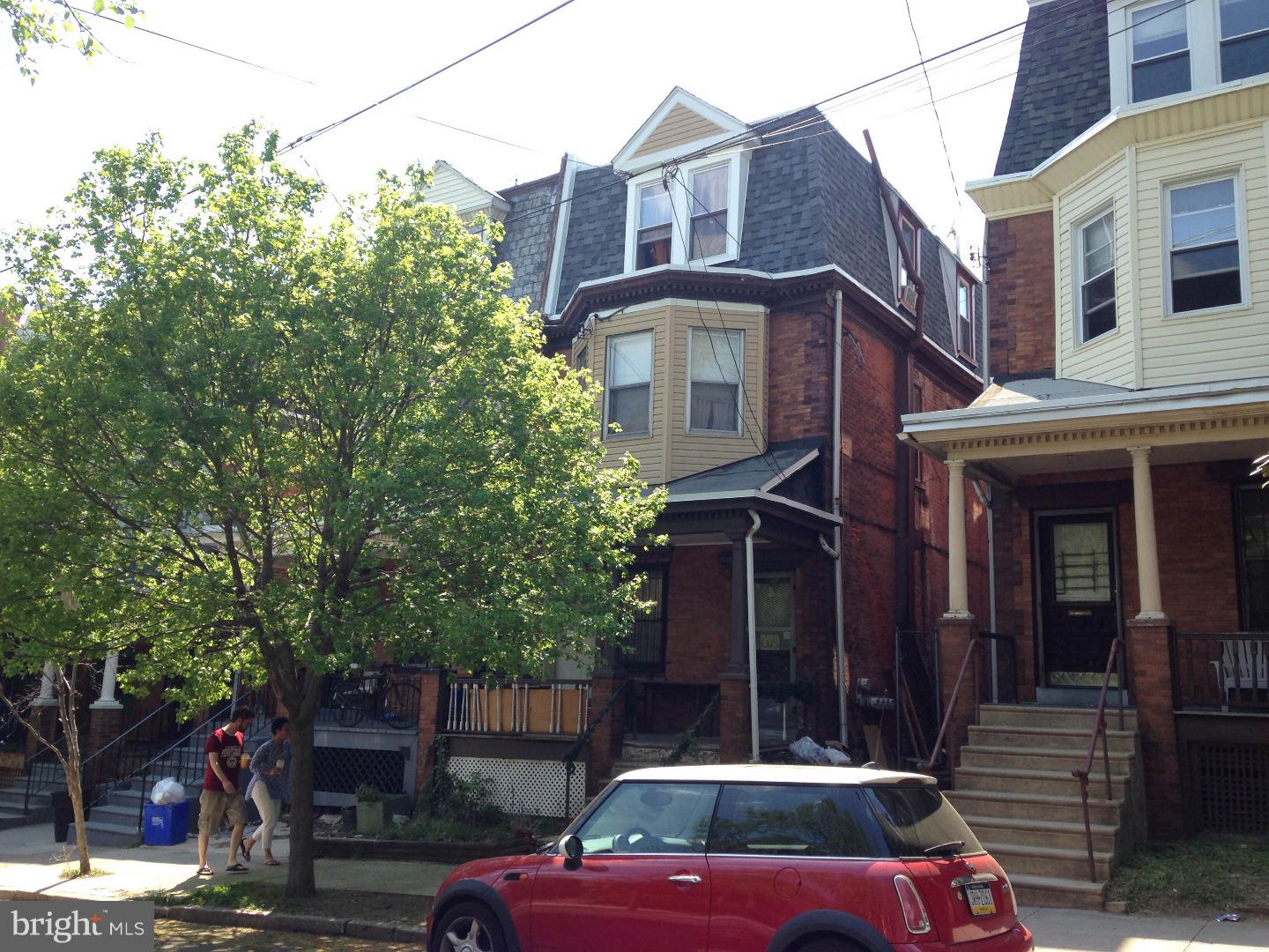 2 bed 2 Bath First Floor Apartment with porch front and back yard just off Baltimore Avenue, close to Clark Park, and All University City.