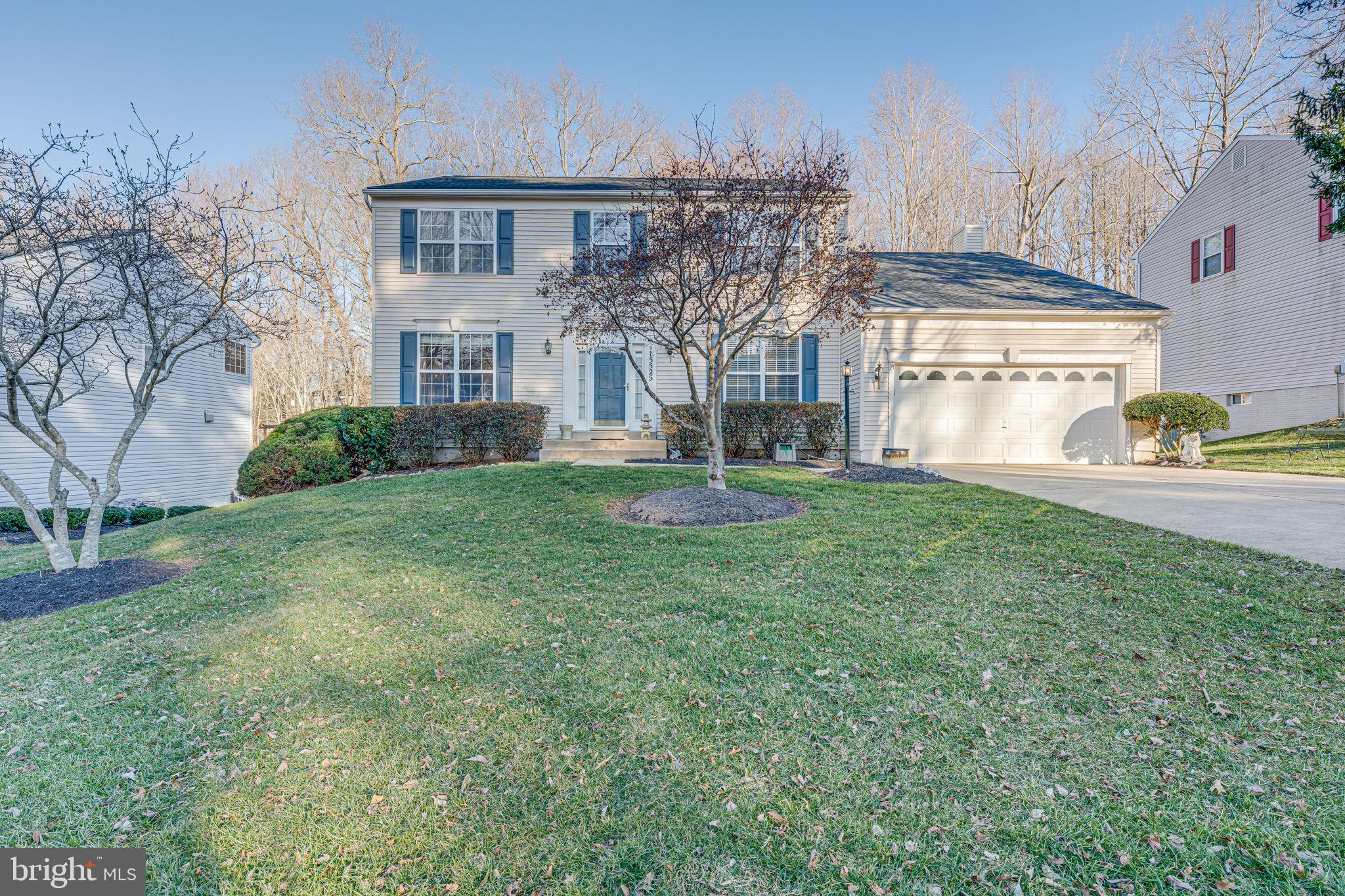 This spacious and neutral 4-bedroom colonial offers a well-appointed floor plan with a large, level rear yard that backs to serene wooded views. The eat-in kitchen is ideal for casual dining, while the step-down family room with sliding glass doors provides easy access to the deck, making it perfect for entertaining.
The lower level features a recreation room with sliding glass doors to the rear yard, offering additional space for relaxation or play.  Ashland is one of the most desired communities in Prince William County due to its easy access to I-95, Quantico MCB, incredible schools and across the street from 15,000 acre park (Prince Willam Forest Park with trails, camp sites and tons of nature)**  $5000 toward flooring and a few window seals in the form of a closing costs credit***
Don’t miss out on this incredible opportunity!