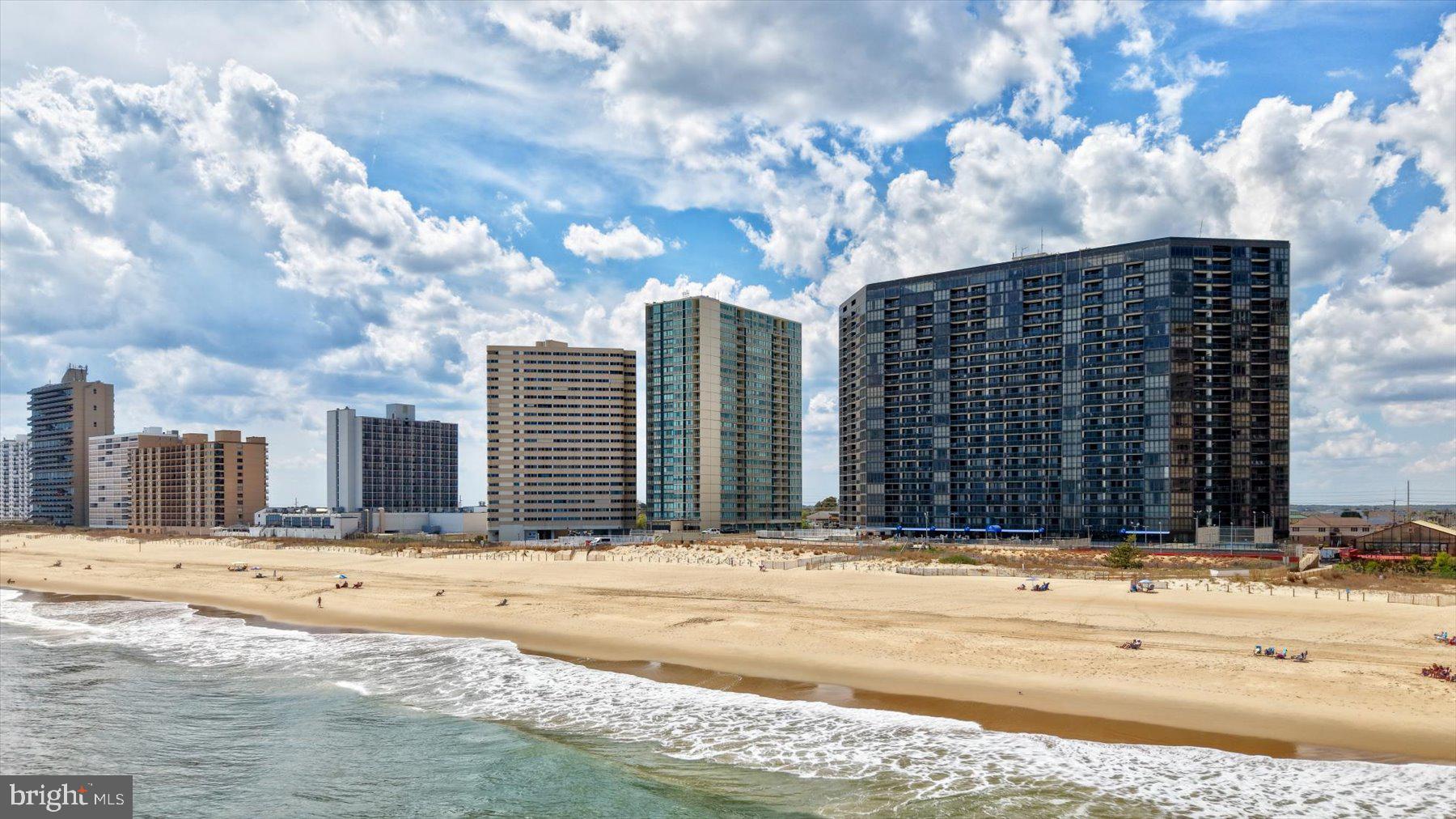 Perched atop one of Ocean City’s most sought after oceanfront buildings, this exceptional penthouse in The Quay Condominium is a true showstopper. Completely reconfigured and remodeled from top to bottom, this rare 2 level residence offers a refined coastal lifestyle with breathtaking, unobstructed ocean views from nearly every angle.

From the moment you step inside, you’re greeted by dramatic floor to ceiling windows that flood the space with natural light and showcase the sparkling Atlantic. The open concept main level is designed for both relaxation and entertaining, seamlessly blending the living, dining, and kitchen spaces. The stunning kitchen is a centerpiece, featuring stainless steel appliances, a double oven, open shelving, ample cabinetry, and a striking full height backsplash that elevates the entire design. The dining area comfortably accommodates a large table, perfect for hosting gatherings by the sea.

The living room is equally impressive, bright, airy, and anchored by panoramic ocean views, with direct access to the private balcony where you can soak in the sights and sounds of the shoreline.

The primary suite, located on the main level, is a serene retreat that truly feels like a vacation every day. Thoughtfully designed with incredible décor, including eye catching palm leaf wallpaper, this space is highlighted by a full wall of windows overlooking the ocean. A spacious closet and a beautifully designed bathroom with a separate changing area complete the large suite (20'0"× 12'3").

Up the spiral staircase, the second level continues to impress with a lofted hallway that carries the stunning ocean views upward through the expansive windows. Here you’ll find a convenient laundry closet, two additional bedrooms, and a full bathroom. One guest bedroom features a unique wall cutout, offering a glimpse of the ocean (16'2" × 13'4"), while the other is fully oceanfront and impeccably styled ( 12'8" × 12'2"). The bathroom is equally well appointed with tasteful finishes and ample storage.

Every inch of this home has been carefully curated, from the flooring to the lighting fixtures, creating a cohesive, high end coastal aesthetic where no detail has been overlooked. This unit also has strong rental potential. 

Residents of The Quay enjoy a wealth of amenities, including both oceanfront & heated indoor and heated outdoor pools, an arcade, meeting rooms, a ping pong room, tennis/pickleball courts, outdoor showers and secure front lobby access, all in a prime Ocean City oceanfront location. The Cafe is open on the 2nd floor during peak season for food, ice cream, coffee & more! The lobby has been updated and the entire building's exterior is in the process of a full recoat/painting. 

This is a rare opportunity to own a truly one of a kind penthouse that perfectly blends luxury, comfort, and unmatched views!