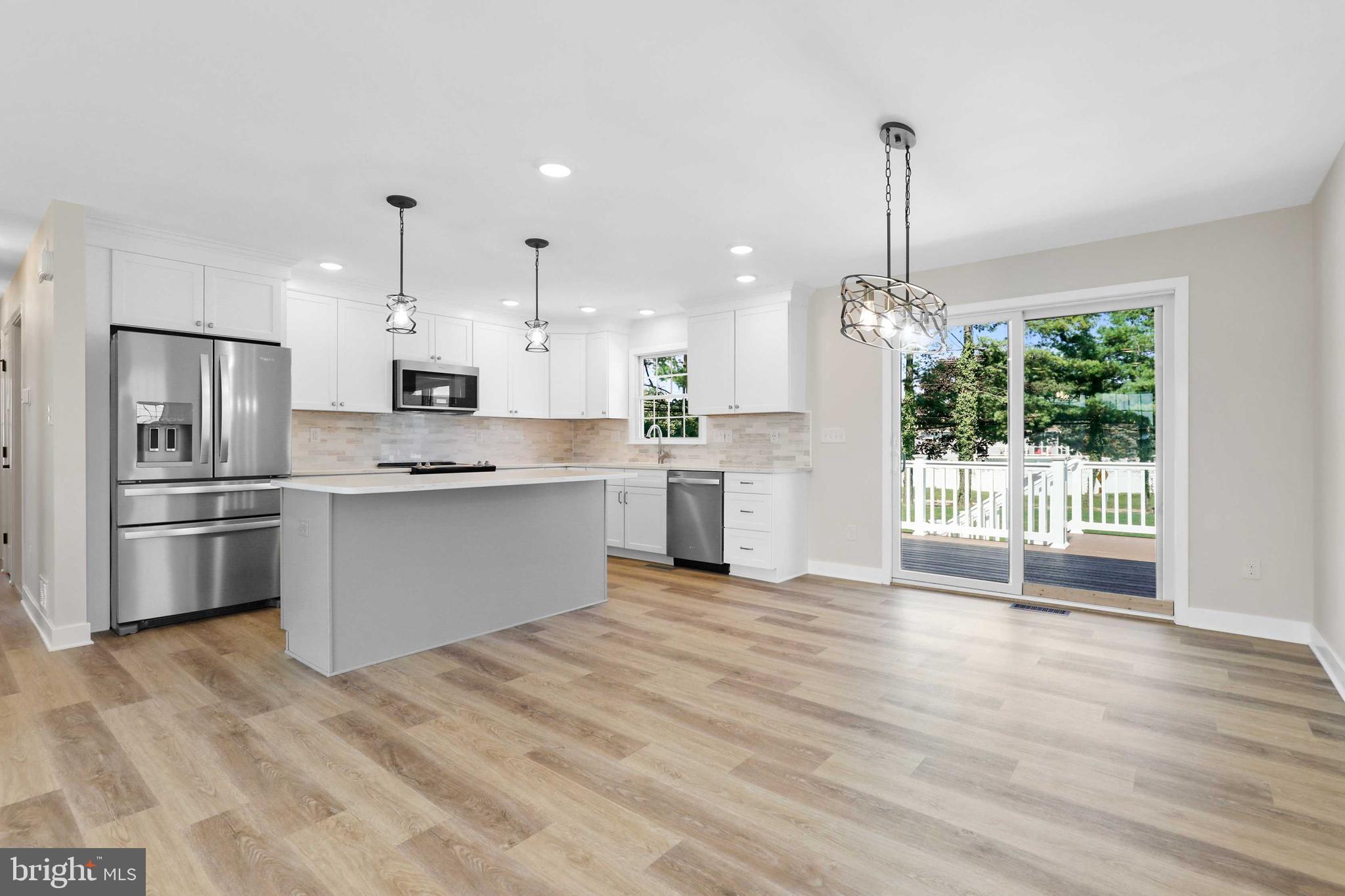 Stunning completely renovated home in Brentwood Park! Open kitchen with white shaker cabinets, quartz counters, island with pendant lights and stainless steel appliances. New faucets come with lifetime stem warranty, and appliances that have 5 year extended warranties will be transferred to the purchaser. Primary bedroom with two closets and en suite bath with stand up shower. Brand new Andersen series 400 windows with full screens and both sashes operate and tilt for cleaning. These windows come with a 20 year glass warranty.  The lower level is fully finished with a large family room area with gas fireplace, two additional bedrooms, full bath and laundry room. Beautiful composite deck and paver patio perfect for outdoor entertaining!  Mohawk LVT and new LED lighting throughout this home that features USB charging ports in every outlet. Store everything you need in the 12'x12' Storage unit. Whether warm or cold, you will keep your home just how you like it with brand new high efficiency TRANE HVAC system,  front and rear doors are THERMA TRU fiberglass doors and finally an additional 12” of insulation in attic areas to make a minimum of R-49 value. Send the kids off to Fallston Middle and High School.  Absolutely gorgeous!