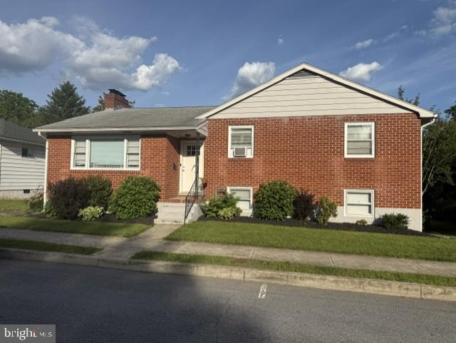 Welcome home to this adorable, recently renovated three-bedroom, two full bath tri-level conveniently located in Hagerstown's South End. This open floor-plan home is a must see!  The main level features include a large kitchen with stainless steel appliances, a massive living room with plenty of space for a growing family, dining room area, and an intimate, screened-in enclosed porch just off the kitchen.  The upper level showcases the main full bath, generous master bedroom with dual closets, and 2 additional bedrooms. The lower level boasts a huge family room with gas fireplace, a custom entertainment center, large bar area with sink, a beer fridge and a second wine fridge.  This level also features an additional room currently used as an office, that would be perfect for an additional bedroom if needed.  A full bathroom, laundry area, and access to the oversized garage are also conveniently located on this level.  And you'll just love the added bonus of the cute reading nook tucked under the staircase!
Outside, the property is equally impressive. The beautifully landscaped yard features a patio and enclosed porch, ideal for outdoor dining or morning coffee. The fire-pit/entertainment area and playground equipment provide a perfect spot for leisure and recreation, while the outbuildings offer additional storage or workshop spaces. With a paved driveway, attached garage, and carport, parking is a breeze. This home is not just a residence; it's a lifestyle. Experience the perfect blend of comfort, elegance, and functionality in a location that offers both tranquility and convenience. Embrace the opportunity to make this stunning property your own and experience this private escape. Purchasing this home may qualify for the City of Hagerstown Homeownership Initiative grant program.  Professional photos coming soon!  Call Listing Agent with any questions. This one won't last, don't miss out.