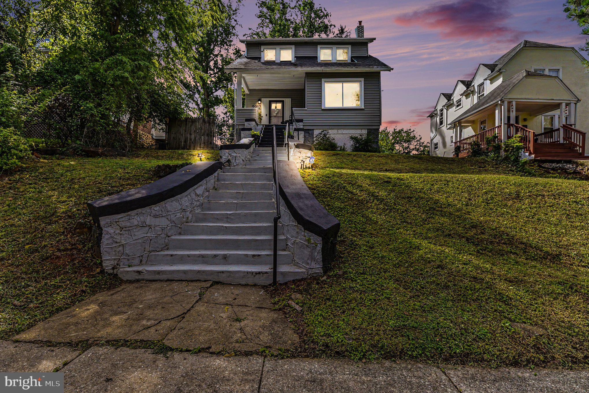 Welcome to 2917 Silver Hill Ave! This beautifully updated 4BR/3.5BA home features an open-concept main level with elegant coffered ceilings, abundant natural light, and seamless living and dining spaces—perfect for everyday living and entertaining. The modern kitchen overlooks the main living area, creating an inviting atmosphere. The fully finished basement includes a private bedroom and full bath, ideal for guests, extended family, or a home office. The spacious primary suite and generously sized secondary bedrooms offer comfort and flexibility. Complete with a convenient 2-car parking pad, this move-in-ready home combines style, function, and modern updates in a desirable layout. Schedule your showing TODAY!