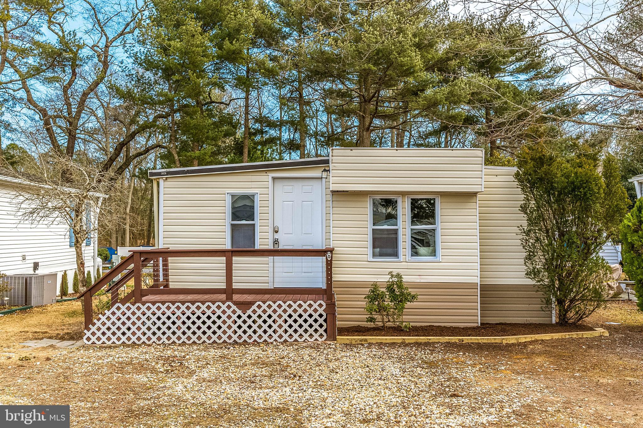 Discover the perfect Eastern Shore retreat just minutes from Ocean City. Located in the gated community of White Horse Park I, this beautifully renovated home offers 2 bedrooms, 2 updated baths, and a versatile bonus room ideal for guests or a home office.
Inside, enjoy a stunning new kitchen featuring quartz countertops, white shaker cabinetry, and stainless steel appliances. Stylish upgrades continue throughout with new flooring, custom tile baths, generous storage, and a private shed. Recent roof repairs provide added peace of mind.
The low $185/month HOA fee includes water, sewer, trash, security, and access to resort-style amenities including a clubhouse, pavilion, boat ramp, basketball court, playground, kayak storage, picnic areas, and bath houses. Marina boat slips and storage are also available.
Open year-round, this property offers excellent flexibility for personal use or short-term rental potential. Conveniently located near the Ocean City Boardwalk, Assateague Island National Seashore, and the charming shops and dining of Berlin, this is coastal living at its best!