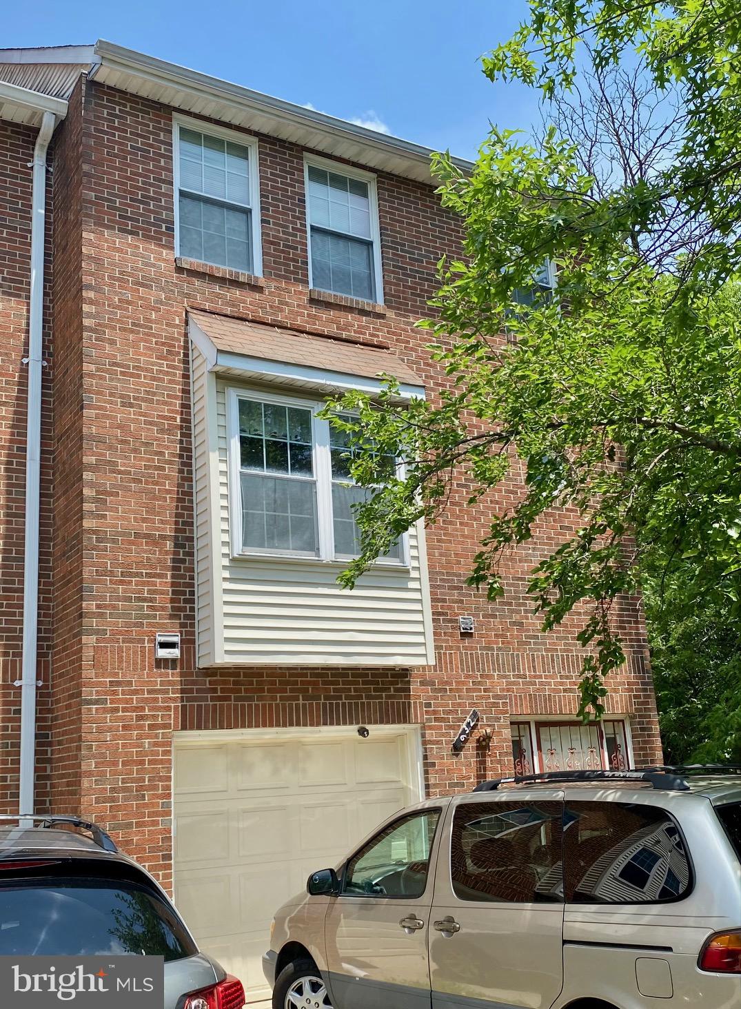 GREAT VALUE:  Priced below assessment, this three-level townhouse with a basement rental unit is located within  the Takoma Park Historic District  just off New Hampshire Ave, a major traffic thoroughfare.   The home  includes a large garage and spacious yard; space for an office, family room  or bedroom on the mail level; an eat-in kitchen and separate dining room upstairs,  carpeted and hardwood floors throughout,  a bathtub with tub jets; and a centrally-located fireplace  in the living room to keep you cozy on winter evenings.  No HOA Applies.  Don't miss making this spacious home your own.  Call to schedule an appointment.