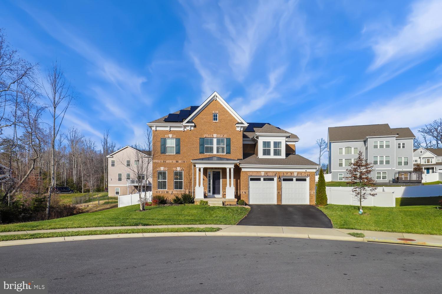 This stunning 5-bedroom, 4.5-bath home in the sought-after Liberty Knolls community of Stafford is a true gem. Updates galore! With over $125,000 in upgrades- pride of ownership is evident throughout. Among many, many others- here are a couple of the very unique features and updates that come with this home- Brand new paid off solar panels with batteries. The batteries will supply power to the main level and the sump pump in the event of a power outage. Custom closets. Premium white picket fenced backyard sitting on a quarter acre lot in a cul-de-sac. Tankless water heater for very low energy bills and never ending hot water. Water purifying system. New back patio with steps. Sprinkler system. Home air purifier. Built in Wi-Fi extenders. Gorgeous new LVP flooring. The open layout creates a welcoming atmosphere, and the large kitchen boasts stainless steel appliances, gas cooking, and an oversized center island with a tasteful backsplash. A bonus room off the living room makes for an ideal home office. The main level also features a formal dining room. Upstairs, four bedrooms await, including the primary bedroom with a full bathroom featuring a dual sink vanity, walk-in shower, and soaking tub. Two bedrooms share a convenient Jack-and-Jill bathroom. The finished basement adds extra space, perfect for a home gym or theater. Step outside to the backyard, fully fenced for privacy. A spacious deck opens up to a separate patio space, creating an ideal setting for outdoor entertaining. Did I mention the amazing community and the fact that this home is zoned for the most desired and highly rated schools in Stafford County? The elementary schools and within close proximity- there is a connected path through the neighborhood. Don't miss this amazing opportunity to buy a home with all the bells and whistles for years and years of worry free living. Schedule a tour today!
