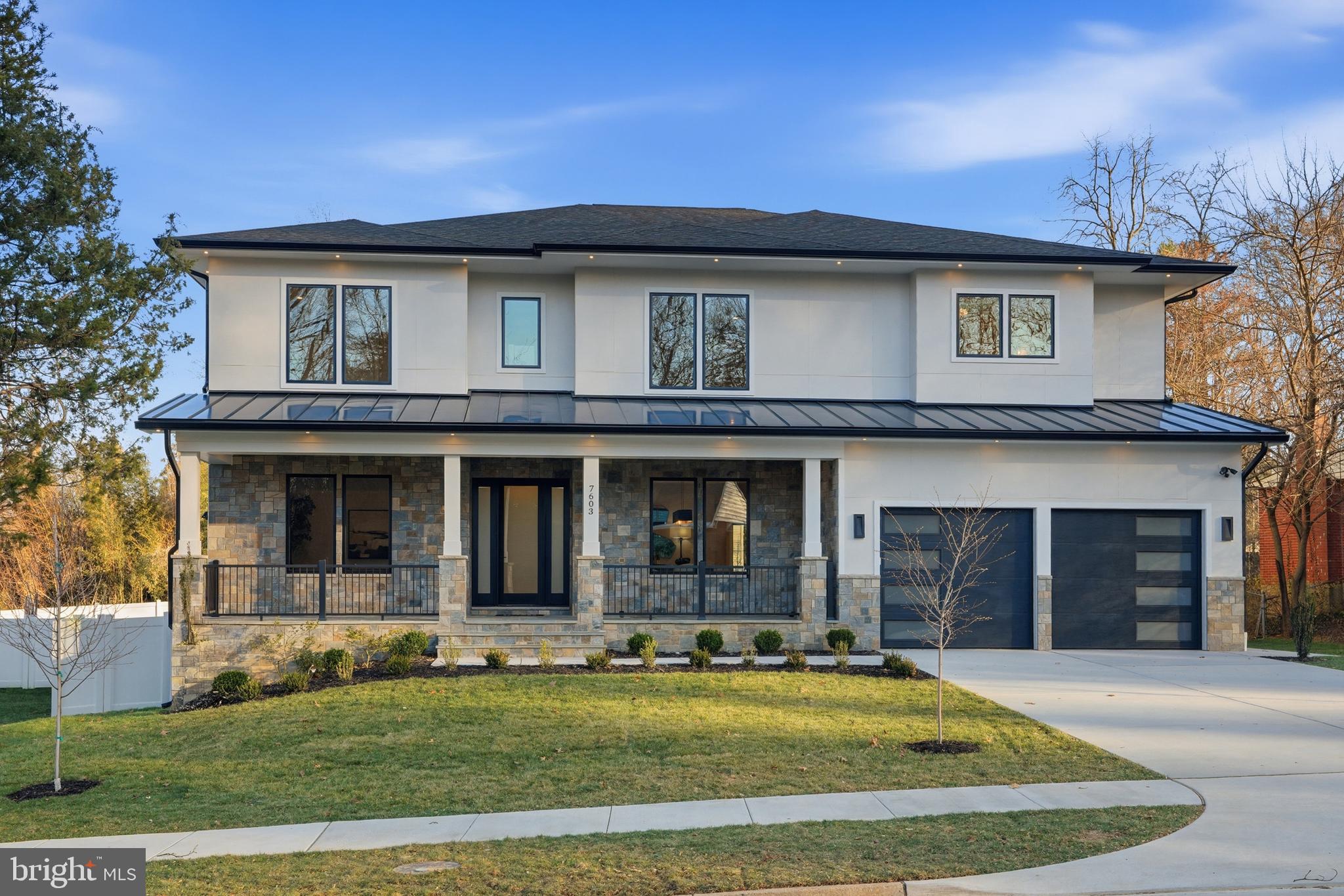 Introducing a spectacular newly built home with a two-car garage, thoughtfully designed to blend modern style with luxurious comfort. Offering approximately 7500 square feet of beautifully designed living space, this impressive residence showcases suspended ceilings, stained hardwood floors across two levels, and exceptional craftsmanship throughout. 

The main level features a private bedroom or office with an en-suite bath, along with a stunning Chef’s Kitchen complete with Quartz countertops, high-end appliances, and an oversized pantry. Just off the breakfast room, a stone-covered porch provides the perfect place to relax or entertain.

Upstairs, the luxurious primary suite includes dual walk-in closets and a private balcony. The upper level also offers two additional en-suite bedrooms, two more bedrooms connected by a shared full bath, and a spacious laundry room for everyday convenience.

The walk-up lower level is designed for entertaining, featuring a signature Quartz bar with a beverage cooler, dishwasher, and glass shelving, a large recreation room, media room, and two additional bedrooms, and a full bath. Outside, enjoy a professionally landscaped, fenced yard and the convenience of an attached two-car garage.

This floor plan has been a popular model!  Don't miss out.  Seller prefers KVS Title