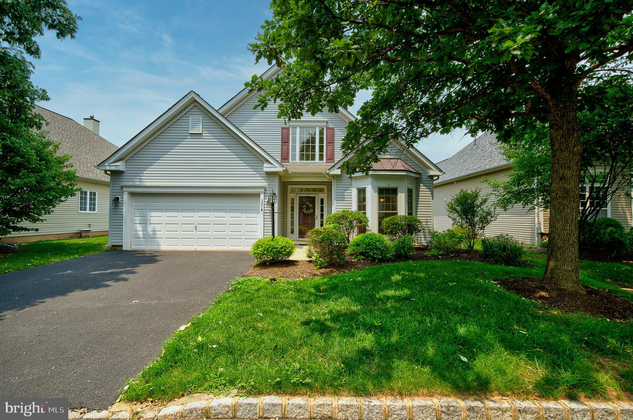 Welcome home to easy, one-level living in this desirable active adult community!  This beautifully maintained two-bedroom, two-bathroom home offers the perfect blend of comfort, style, and convenience.

Step inside to an open and inviting floor plan featuring hardwood floors throughout the main living areas, elegant moldings and wainscoting, and a cozy gas fireplace that creates the perfect gathering space. The kitchen is equipped with granite countertops, stainless steel appliances, a new dishwasher,  and ample cabinetry for everyday living and entertaining.

The spacious primary suite offers comfort and privacy, while the updated main bathroom showcases tasteful finishes and modern appeal with a step-in shower and a soaking tub.  A second bedroom and full bath provide the ideal space for guests or a home office.

Outside, enjoy the convenience of a private driveway and an oversized two-car garage with plenty of room for storage, hobbies, or a workshop.

Amenities of this sought-after retirement community include a clubhouse, heated outdoor pool, walking path, fitness center, tennis and bocce courts and a library.  This home is just minutes from shopping, dining, golf courses, healthcare, and major roadways. This move-in-ready home is waiting for you!  

So, if you're ready, let's go home!
