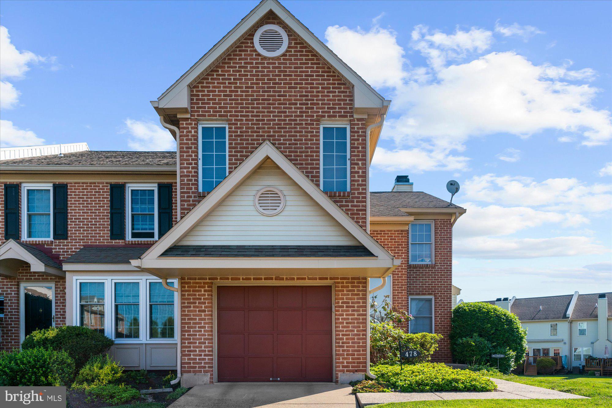 Welcome to this beautifully maintained brick-front end-unit townhome offering 3 bedrooms, 2.5 baths, and an attached garage in a desirable Harleysville location. This home combines thoughtful updates, spacious living areas, and a private setting that is hard to find.

The main level features gleaming oak hardwood floors installed in 2022 throughout the living and dining rooms. A custom-built wall creates a seamless flow between the living and dining spaces while maintaining an open and inviting atmosphere. The kitchen is ideally situated near the family room and offers convenient access to the private backyard, where you'll enjoy permanent open space behind the home with no future development permitted.

Recent improvements provide peace of mind, including a new roof (2018), furnace and central air conditioning (2010), kitchen stove (2021), washing machine (2023), and Pella kitchen windows (2024). Granite countertops enhance two bathrooms, while additional updates include a heated and finished basement area with a gas wall heater installed in 2022, creating comfortable year-round living space.

Additional highlights include a hardwired Slomin's home security system, a garage door opener with exterior keypad and smartphone operation capabilities, aluminum firewall coping, and abundant storage throughout.

Conveniently located near shopping, dining, parks, and major commuter routes, this move-in-ready home offers the perfect combination of comfort, functionality, and long-term value. Don't miss the opportunity to make this exceptional property your next home!