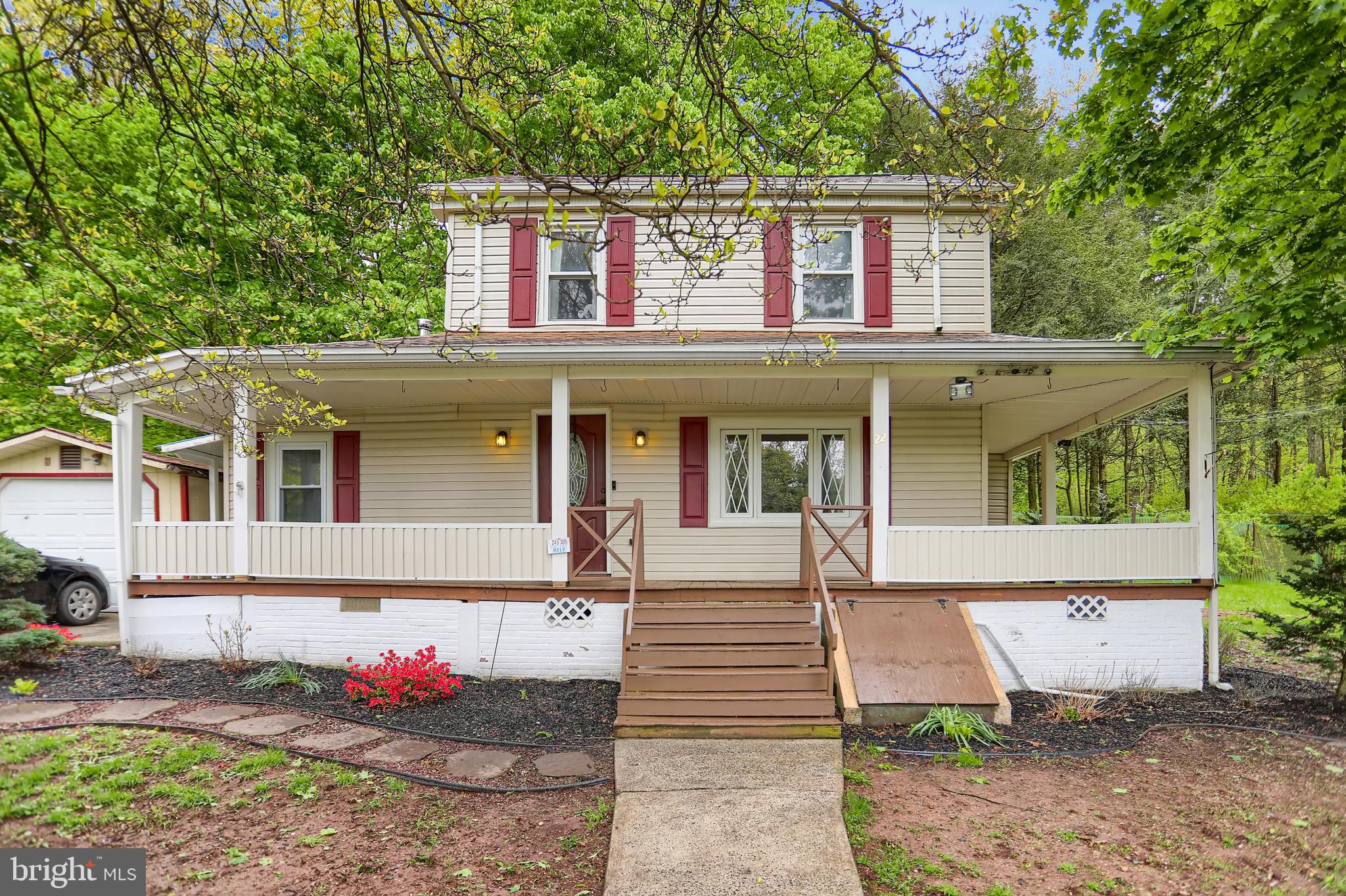 This is the house in the country you have been waiting for.  A total of 1.3 acres of green grass gives you all the space to run and play.  Store all your big and little toys in the three garages outside.  The house boasts big windows, open floorplan and space.  Updated kitchen and flooring, with a large mudroom and convenient full bath.   Upstairs, lots of built in storage and three bedrooms.  Huge front porch to relax and breathe in that fresh air.   Key location- less than 3 miles from Route 81.  Get to work and get home to your dream in the country!