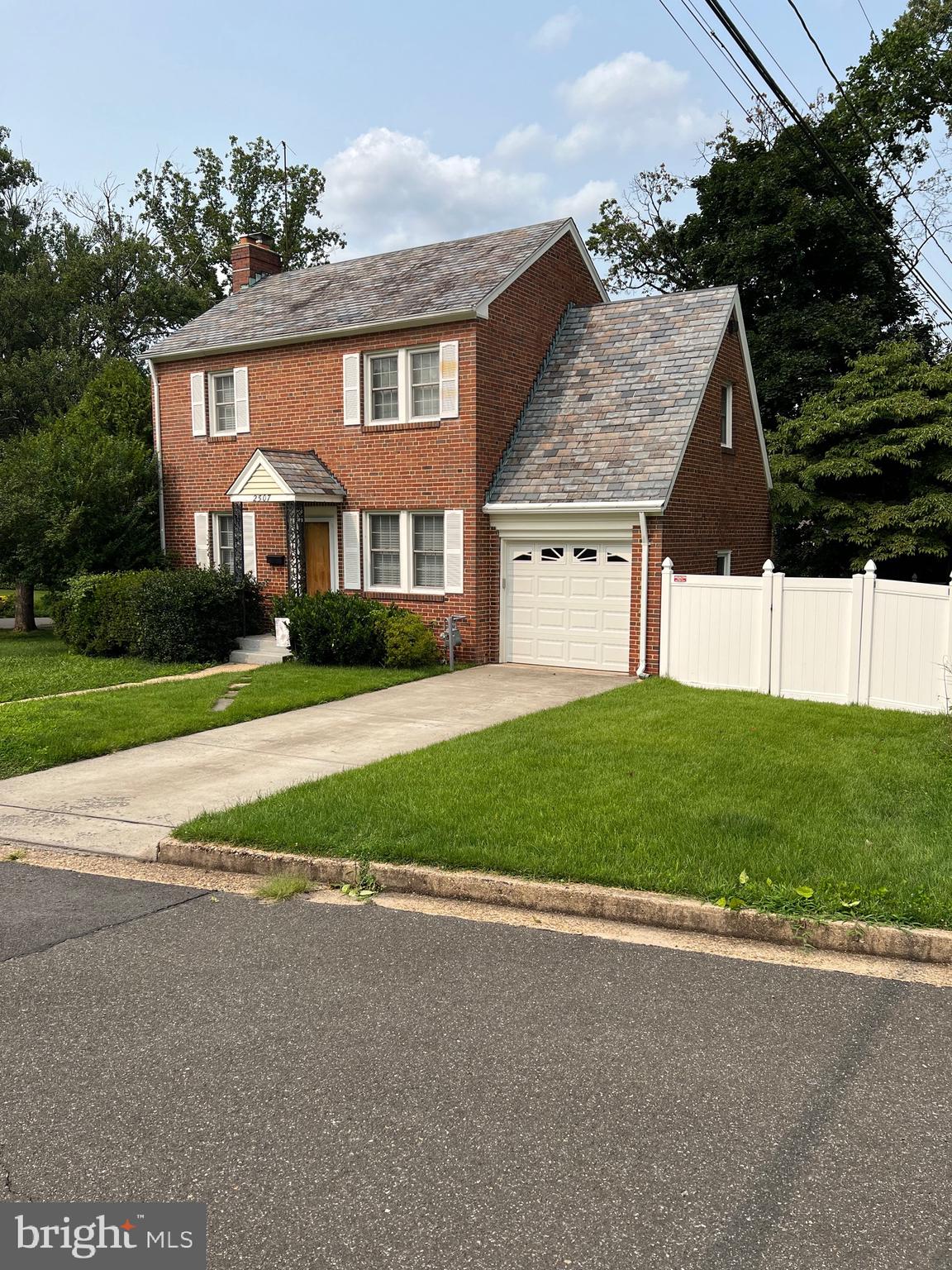 Sited on a large corner lot,  this 2BR/2BA colonial is located in sought out Garden City which is walkable  to shops, restaurants, Metro Bus Stop, parks and more... Hardwood floors on main and upper levels, kitchen with gas stove, family room with wood burning fireplace that opens to a porch for morning coffee and a fabulous side yard for fun, outdoor games.  Backyard is fully fenced with a detached  1 car garage in addition to the attached garage.  Discovery, Williamsburg, Yorktown District school tier.