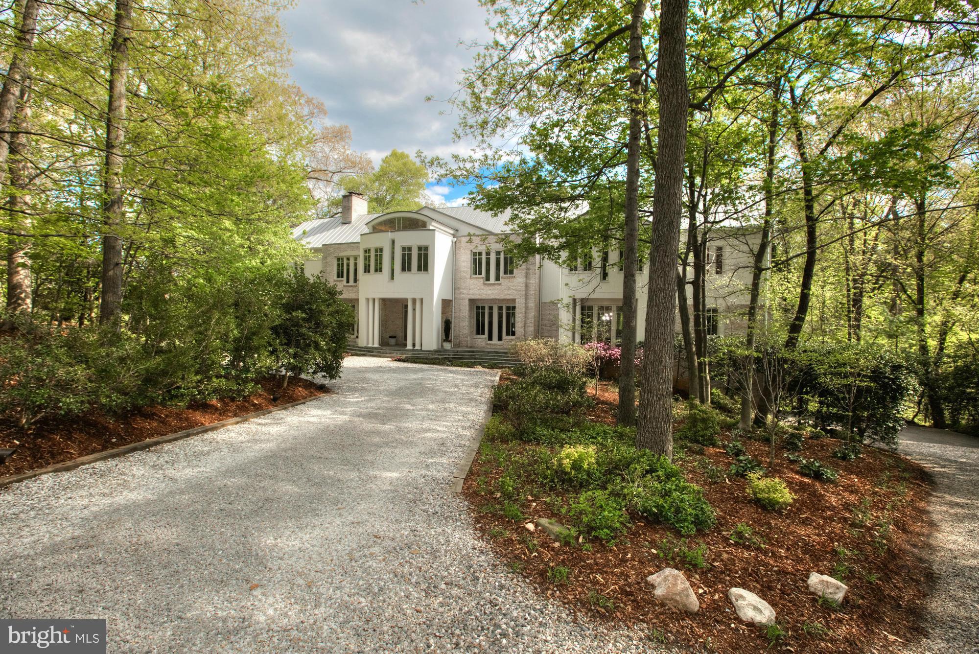 Custom contemporary residence on desirable Potomac School Road is situated on over 2.75 private & serene acres; minutes to downtown McLean & DC. This light-filled house offers a 2-story foyer, study, kitchen opens to family room, expansive master suite & walkout lower level. A main level terrace & lower level deck run the length of the house w/ a 55' x 11' lap pool & hot tub. See VT for 3D tour.