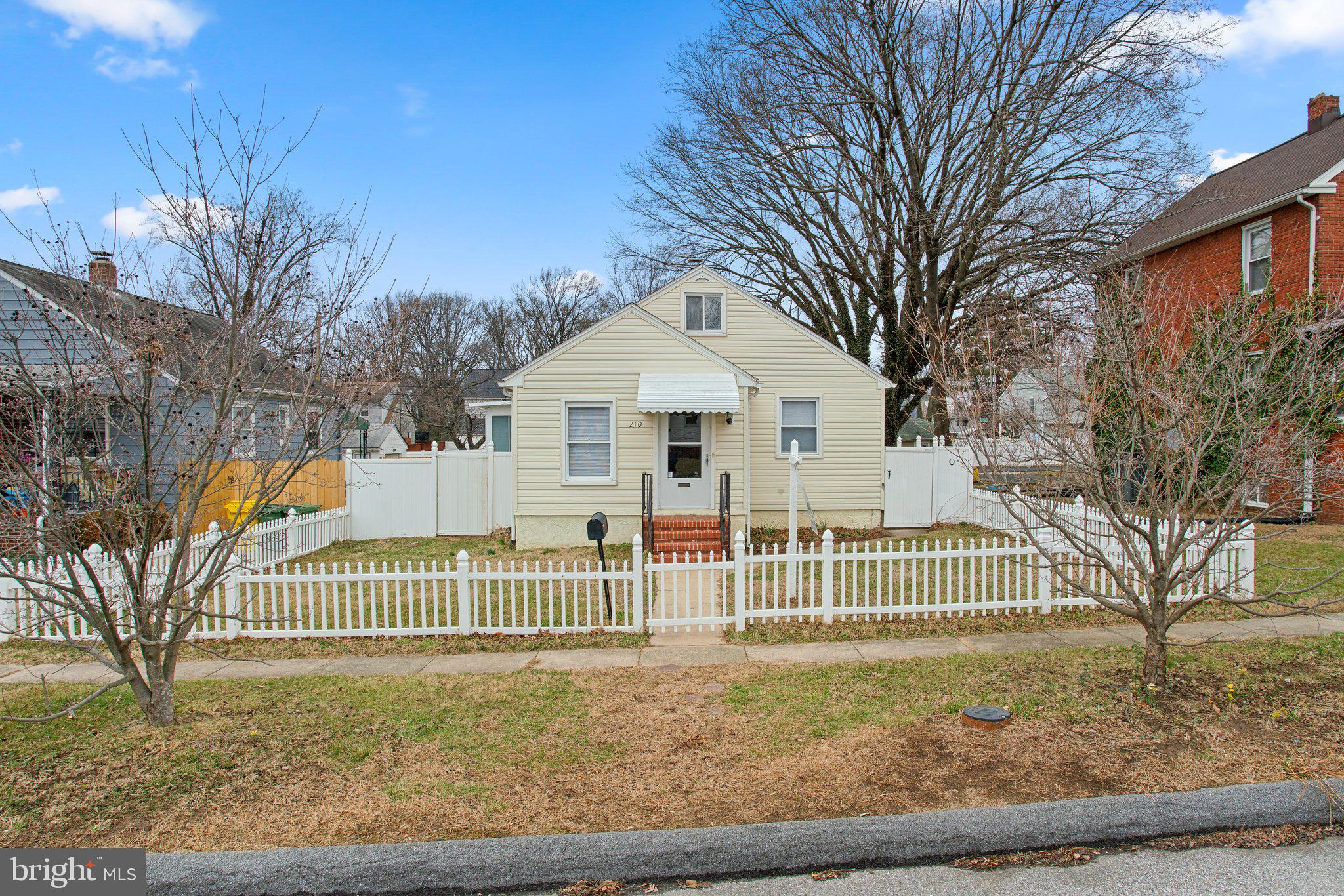 Welcome to 210 W. 11th Ave in Brooklyn Park Anne Arundel County. This home has been well maintained over the years and is ready for the next chapter. Step inside to discover brand-new flooring throughout, offering a fresh and stylish foundation to create your ideal living space. The main level has everything needed to live comfortably. Highlights include a true primary suite with attached full bathroom, an open living room space that is large enough for a living room and dining room, and a very spacious kitchen. A second bedroom and bathroom are also located on the main level along with a three season sun room off of the kitchen. On the top floor you will find a large room that could be a third bedroom, an office or another living room space. The basement is unfinished with a workshop area and plenty of storage. The yard is flat and fully fenced in and ready for gardening or gatherings. At the rear of the lot is where the large garage and driveway are located. The garage also has a large space that is perfect for a workshop or storage. This home has everything you need and ready for the next owner to make it their own.  This is an estate sale.