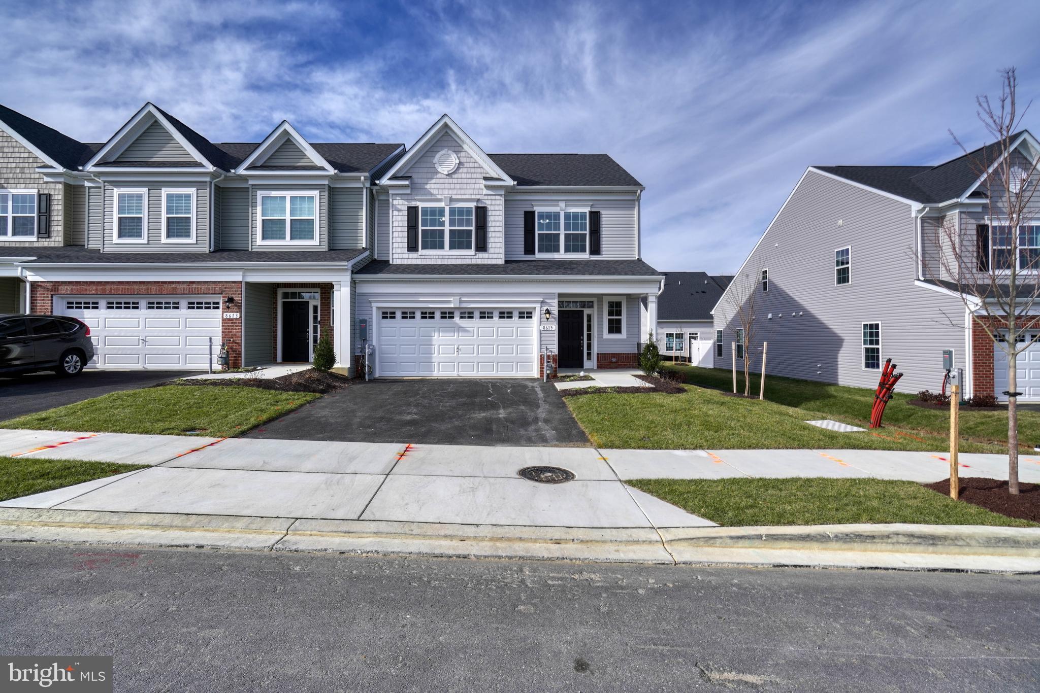 Welcome to 8615 Hines Circle, a brand new home in The Enclave at Hines Farm - an Active Adult 55+ Community full of ammenities, including an indoor pickle ball court and community clubhouse. This spacious end of row villa is thoughtfully designed, with an attractive floor plan that includes a bright and open kitchen, tons of natural light, and an entry level primary bedroom suite - complete with a large walk-in closet and beautiful en suite bathroom. The main level also features main-level laundry, a coat closet, dining area, and living room with an eclectic fireplace and access to the rear yard (which the owner's plan to install a fence around in the near future). The upper level offers two additional bedrooms with large closets, a full bathroom, a second laundry room with hookups, as well as a loft area. The finished lower level provides tons of extra space including a rec room with a wet bar, storage area, and an additional full bathroom. This home also offers a convenient location within Howard County - just minutes away from local restaurants, shopping, grocery stores, and so much more. Per neighborhood restrictions, at least ONE tenant must be over the age of 55+ to qualify.  No full-time residents can be under the age of 18.