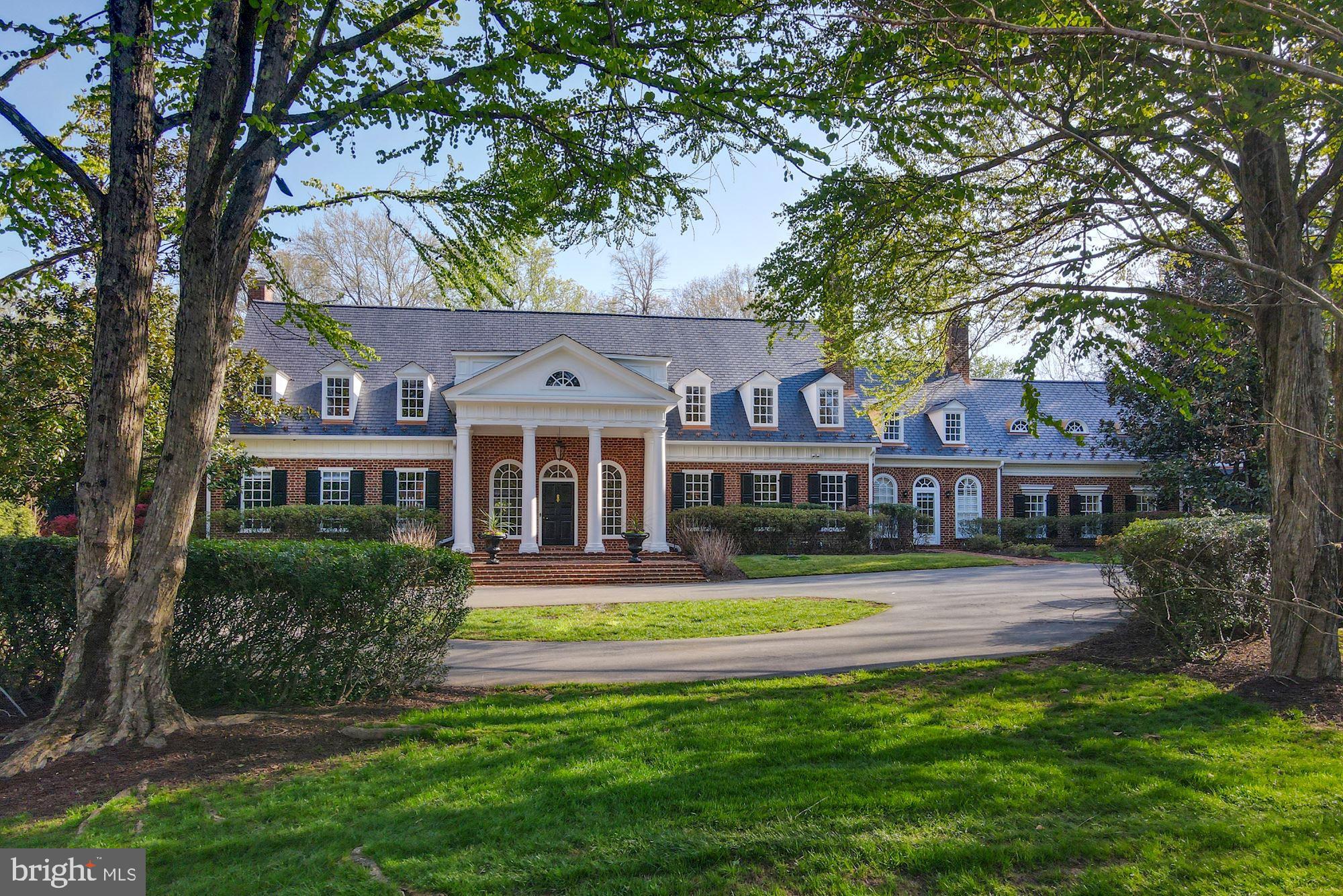 Magnificent: Grand Cullinane Georgian Estate extensively renovated from 2021-2022. This property exudes style and sophistication. The classic gated entrance welcomes you to this amazing property set on 2 acres. Enter the grand living and entertaining spaces through a breathtaking two-story foyer. With approx. 11,100 sq.ft., and a total of 6 bedrooms, 7 full and 2, 1/2 bathrooms, this home has been transformed to deliver both formal and casual living spaces with an office, library, formal living room, and a pristine, fully renovated kitchen featuring high-end Sub-Zero and Viking appliances, making it a gourmet’s dream. Completing the expansive first floor are a large, yet intimately styled dining room for formal entertaining, a fully restored solarium where you can enjoy family meals or afternoon tea, a cozy family room with exposed brick and Palladian windows, 2 new powder rooms, and a new laundry/mudroom for today’s active family. Tasteful architectural details, 6 fireplaces and handsome wide-plank hardwood floors make for a showstopper experience. The 2nd floor features 5 large en-suite bedrooms with brand new timeless bathrooms, new custom closets and an additional washer and dryer. The serene master-suite is a true retreat with a full-sized dressing room, gentleman’s closet and a spa-like Carrara marble bathroom with an oversized free-standing soaking tub and steam shower, perfect for relaxing. The complete lower level offers a generous recreation room w/ bar, home gym, full bathroom, and an abundance of storage. A breezeway connects a separate, above garage apartment with a full bathroom for out-of-town guests, hangout, or in-law quarters. The secluded outdoor space is perfect for peaceful weekend or and family fun with two brick patios, a covered lanai and a heated pool that was freshly resurfaced in 2022. Feel secure with the gated lot, mature trees and brand new extensive, safety landscape lighting and app-based security camera system. Meticulous attached garages feature new doors, mechanicals and epoxy flooring. This amazing property exceeds expectations and is a must see to be truly appreciated.