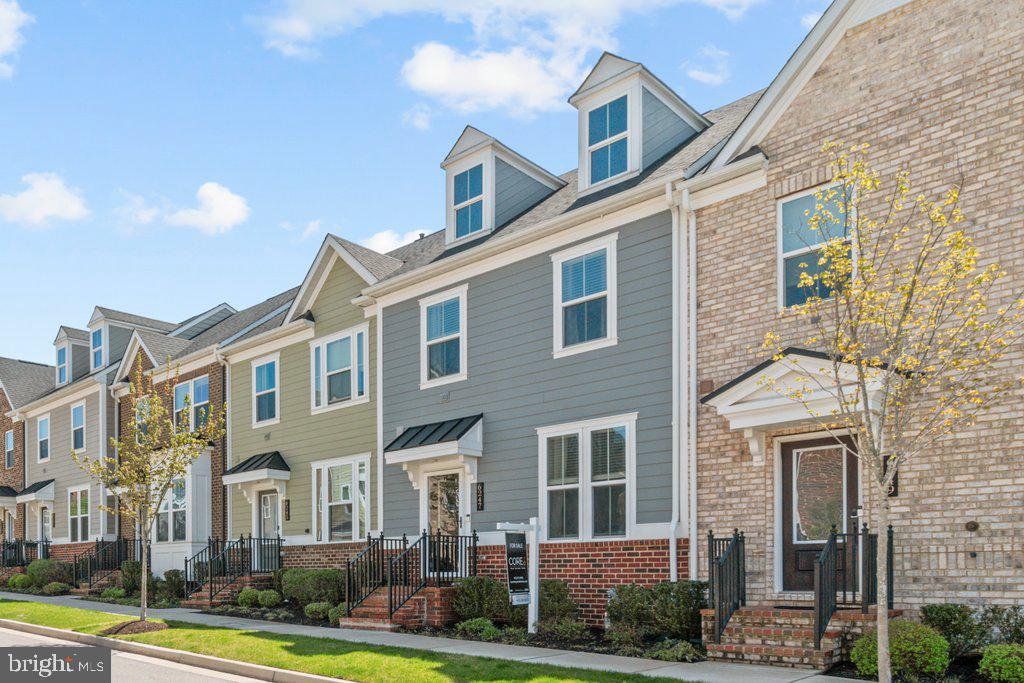 Welcome to 6247 Islington St., a stunning Craftsman-style townhome located in the vibrant Greenleigh at Crossroads community. Built in 2020 by Ryan Homes, this highly sought-after Strauss floorplan offers the perfect blend of modern design, functional space, and upscale finishes—all in a thoughtfully planned community setting.

With four bedrooms and four and a half bathrooms, this home is designed for flexibility and comfort across every level. The main floor features an open and inviting layout, complete with a convenient half bath and a beautifully appointed kitchen. Enjoy granite countertops, GE appliances, cabinet crown molding, and a seamless flow into the living and dining spaces—ideal for both everyday living and entertaining.

Upstairs, the first upper level hosts three spacious bedrooms and two full bathrooms, including a well-appointed primary suite.  The upper level also features a separate laundry room. The second upper level offers a private fourth bedroom with its own full bath, creating the perfect retreat for guests, a home office, or additional living space. The lower level adds even more versatility, featuring a full bathroom and a dedicated office or study that can easily function as a fifth bedroom.

Since the original build, thoughtful upgrades have enhanced both style and convenience. The backyard is fully fenced, providing a private outdoor space to relax or entertain. A finished two-car garage includes attic storage above, while added pavers create a clean, accessible path from the garage to the home. Inside, you’ll appreciate details like solid oak handrails, two-panel doors, and a true laundry room—no closet setup here.

Beyond the home itself, Greenleigh at Crossroads delivers an unmatched lifestyle. Residents enjoy access to a state-of-the-art clubhouse, outdoor pool, fitness center with a separate yoga studio, dog park, scenic walking trails, and charming pocket parks throughout the neighborhood.

Offering a rare combination of space, upgrades, and community amenities, this home is perfect for those seeking low-maintenance living without sacrificing comfort or style. Experience upscale urban living in a location that truly has it all. ***This home qualifies for a 1.5% contribution towards closing costs OR towards down payment. Ask how! Virtual tour is available!***