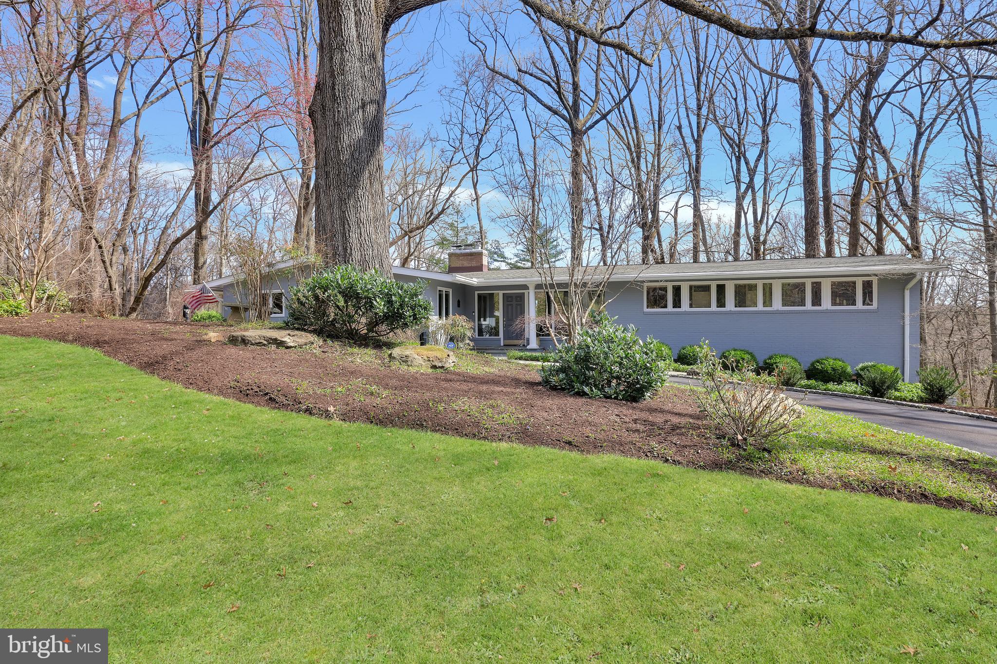 Exceptional Properties. Exceptional Clients. Welcome to 1902 Indian Head Road—a spacious mid-century modern 5-bedroom, plus 2 bonus rooms, 3.5-bath home that perfectly balances comfort, style, and convenience in the heart of Ruxton. Nestled in a tranquil, wooded setting, this meticulously maintained property in Ruxton Hills backs up to Lake Roland Park and is just minutes from essential amenities and quick access to downtown.

Boasting over 5,500 sq. ft., this thoughtfully designed home features a spacious and inviting floor plan, perfect for both everyday living and entertaining. Sunlight floods the interior through large south facing windows, highlighting the gleaming hardwood floors throughout. The gourmet kitchen features stainless steel appliances, a double oven, and a 12-ft. island with floor to ceiling cabinetry offering plenty of storage. A generous breakfast nook off the kitchen overlooks a large bluestone covered patio, perfect for morning coffee or evening relaxation. Come unwind in the family room right off the kitchen, with a wood burning fireplace and elegant built-ins. For more formal entertaining, a seperate grand dining room features crown moulding and easy access to the kitchen perfect for holiday gatherings. Down the hall, enter into a desirable first-floor primary suite with spacious walk-in closets, a luxurious spa-like bathroom, sitting area, and an adjacent laundry room and personal office for a true retreat experience. 

With multi-level living spaces, each adorned with a wood-burning fireplace, there is ample space for both relaxation and entertaining throughout the home. The lower level is a versatile space, designed for entertaining, complete with a wet bar featuring an ice maker, dishwasher, refrigerator, a multi-purpose room perfect for game nights and gatherings, and 3 additional bedrooms/bonus rooms and full bath.  The attached two-car garage and mudroom provide ample storage and convenience, streamlining your daily routines. With these additional bonus rooms comes endless possibilities—think home office, au-pair suite, playroom, or personal gym. 

Step outside the lower level to appreciate the peaceful ambiance of the private patio with a charming moss fountain and room for multiple seating areas. Mature landscaping throughout, enjoy watching the daffodils bloom in the spring, the Japanese maple peak in the fall or the 400 year old majestic oak tree uplit in the front circle. This well-maintained property is complete with an irrigation system, landscape lighting, and gutter guards. 

With many recent upgrades, including a new heat pump installed in 2022, an AC unit added in 2024, a brand new roof in 2021, and a generator, this home offers modern comfort that checks all of the boxes. Schedule your private tour of 1902 Indian Head Road and make it your forever home.