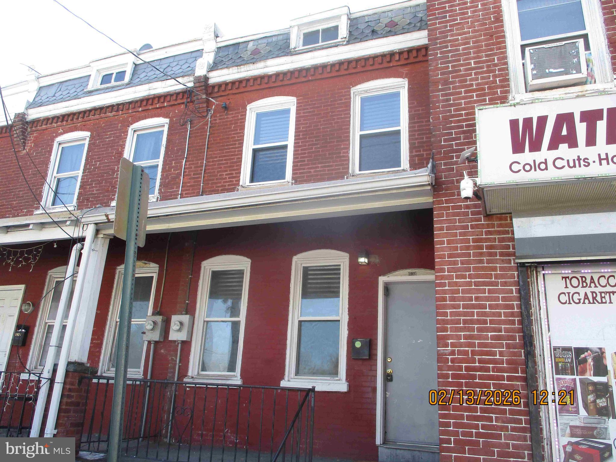 Price Reduced! Brick front townhome with 3 bedrooms, one bath. Amenities include covered front porch, fenced yard, skylight,  basement, living room with mantle, and separate dining area. The front porch overlooks a  park.
