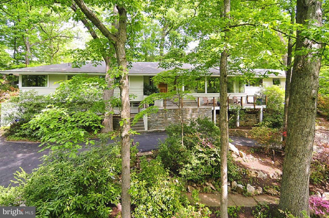 Fabulous Home in tranquil hill top setting in desirable close-in location. Over an acre of beautifully landscaped, abundance of privacy and nature,  Renovated with finest materials in 2009/2010.  The open floor plan invites grande entertaining+comfortable living on one level with superb Great Room, fantastic Kitchen, wonderful outdoor spaces to relax +enjoy.