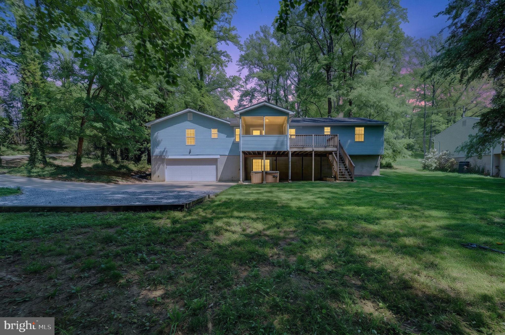 Stunning 5-Bedroom Home on a Private Double Lot in Arnold. Nestled on a rare double lot, this exceptional 5-bedroom, 4 full bathroom residence offers both privacy and versatility in a highly sought after Arnold location, served by top-rated Blue Ribbon schools. Thoughtfully designed, the home provides an ideal layout for multi-generational living, including potential nanny or in-law accommodations. The main level features a spacious and functional floor plan with four bedrooms and three full bathrooms, complemented by gleaming hardwood flooring throughout. The beautifully updated gourmet kitchen is a chef’s dream, showcasing custom inset cherry cabinetry, high-end appliances, a large center island, and abundant counter space. Recessed lighting enhances the bright and inviting atmosphere, while the screened-in porch provides a perfect setting for relaxing or entertaining, with direct access to the adjoining deck. The fully finished lower level expands the home’s living space, offering a fifth bedroom, a full bathroom, and a wet bar with the potential for a second kitchen��ideal for guests or extended family. Additional highlights include fresh paint throughout, four fully updated bathrooms, and a private, level backyard surrounded by mature landscaping. A long driveway leads to a rear-facing two-car garage, adding both convenience and curb appeal. This unique property combines space, functionality, and location—an exceptional opportunity in Arnold.