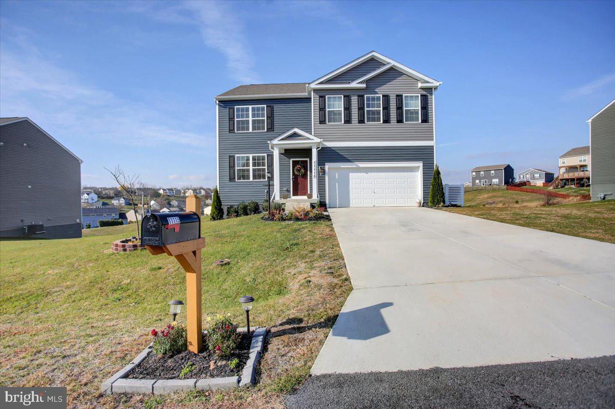Email/text listing agent to schedule your showing today!  Looking for quick settlement. Sellers have found their home of choice.  Move-in Ready – Located in Martin’s Ridge!  5 bedrooms, 3 full bathrooms - featuring 2,511 square feet of living space (plus unfinished basement-approx. 1,255 sq.ft.) with an upstairs loft area, flex room and a 2-car garage.  As you enter the home you are greeted by a flex room, formal dining space, a huge office, or children’s play area. The kitchen features a large central granite island for bar-style eating (seating for 4), entertaining, or cooking that opens to the casual dining area and living room.  Off the living room on the main level is a bedroom with full bath.  Upstairs you will find 4 additional spacious bedrooms, a loft, access to the laundry room, and the owner’s suite, which highlights a huge walk-in closet and luxurious bathroom.  The basement opens to a partially finished recreation room which gives you the opportunity to complete to meet your needs.  Walk out of your basement to a beautiful oversized yard.  Perfect for a patio for entertaining family and friends outside to enjoy sunsets over the breathtaking mountains. The spacious trec deck also provides plenty of space for entertaining.  Some lighting fixtures are negotiable.  The home comes complete with natural light, stainless steel appliances, a 10-year structural warranty, and so much more!  Sellers to find home of choice.  24-hour advance notice required for showings.