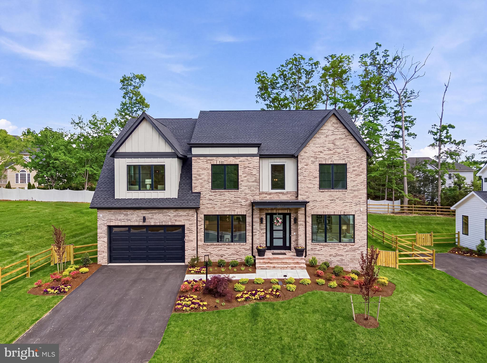 The Wait is Over! Welcome to The Woods at Occoquan Overlook, an exclusive new community by Craftmark Homes in Fairfax County. Homesite 12 featuring "The Maiden" floorplan is fully complete and ready for immediate move-in.
This sun-drenched home is designed for seamless indoor-outdoor living and entertaining, offering panoramic views and elegant formal spaces. Highlights include a gourmet kitchen, a handsome private study, and a luxurious primary suite with a dedicated sitting area for ultimate relaxation. Designer touches throughout; 2-Story Trim Package in Foyer, Thermador Gourmet and a la cart Appliances, Upgraded Light Fixtures, Upg. Trim Package in Dining Room, Cabinets to the Ceiling in kitchen, Tiled Floor to Ceiling Fireplace Surround, Covered Deck, Split Rail Fenced-In Yard, Upgrade Landscaping, touched by designers throughout. Energy Star Certified Construction. High End Brands and High Quality Craftmark Homes Construction. Private setting with wooded area. Perfectly situated near the Occoquan River, Laurel Hills Golf Club, and historic Old Town Occoquan. Visit Builder Website for more information and Email Builder Sales Manager.
Limited-Time Incentives: Ask about our current incentives and rate buy-down programs! Visit Decorated Model First: 9600 Peniwill Dr. Lorton, VA Open Daily, 11 AM–5 PM.