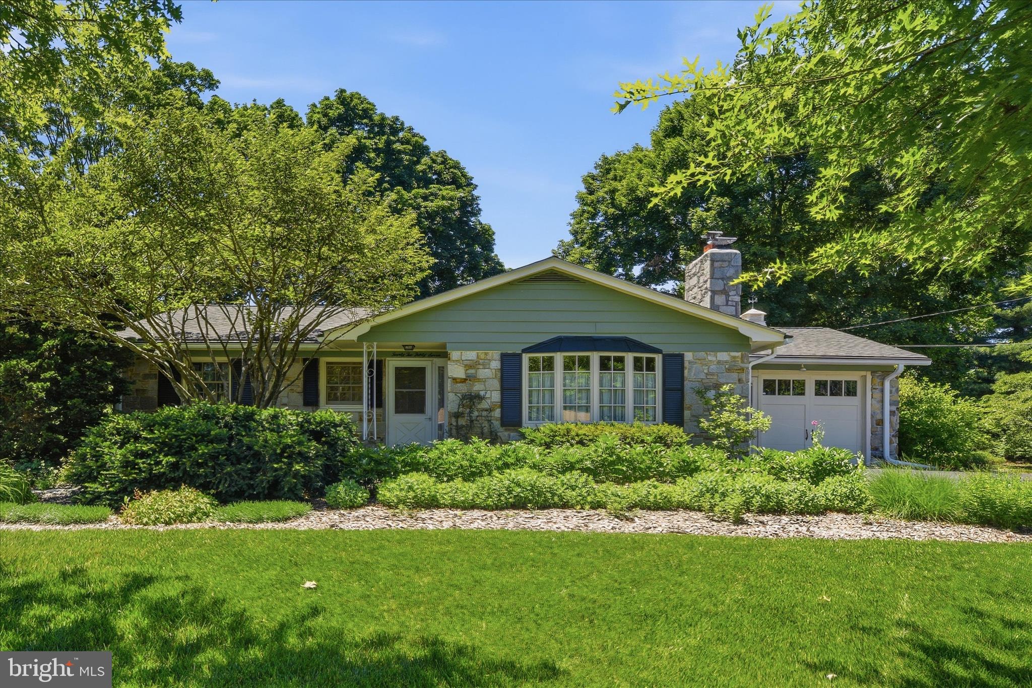 Welcome home to this delightful Butler Stone front rambler featuring 3 bedrooms and 2 full baths. Thoughtfully updated and impeccably maintained, this home is perfect for anyone who values comfort, privacy, and lush cottage‑style gardens that bloom from spring through fall.

✨ Key Features
Butler Stone exterior — timeless curb appeal and classic Maryland charm

Custom remodeled kitchen (2019) with radiant heated floors, Italian ceramic tile, Quartz countertops, new cabinetry, and upgraded KitchenAid appliances

Whirlpool dishwasher added in 2026

Pella windows installed 2014–2019 for energy efficiency and comfort

Roof replaced in 2008

Enclosed carport/garage for secure parking and storage

Gorgeous hardwood floors throughout the main level

Partially refinished basement with a second full bath, ideal for guests, hobbies, or a recreation room

🌿 Garden & Outdoor Living
Professionally curated ever‑blooming cottage gardens

Beautiful patio perfect for morning coffee or evening relaxation

Mature plantings create a private, serene outdoor retreat

Ideal for buyers who love gardening, nature, and outdoor entertaining

* *  * Why This Home Stands Out
Move‑in ready with major systems updated

Warm, inviting layout with excellent natural light

A rare combination of privacy, charm, and modern upgrades

Gardens that truly set this home apart — a showstopper in every season