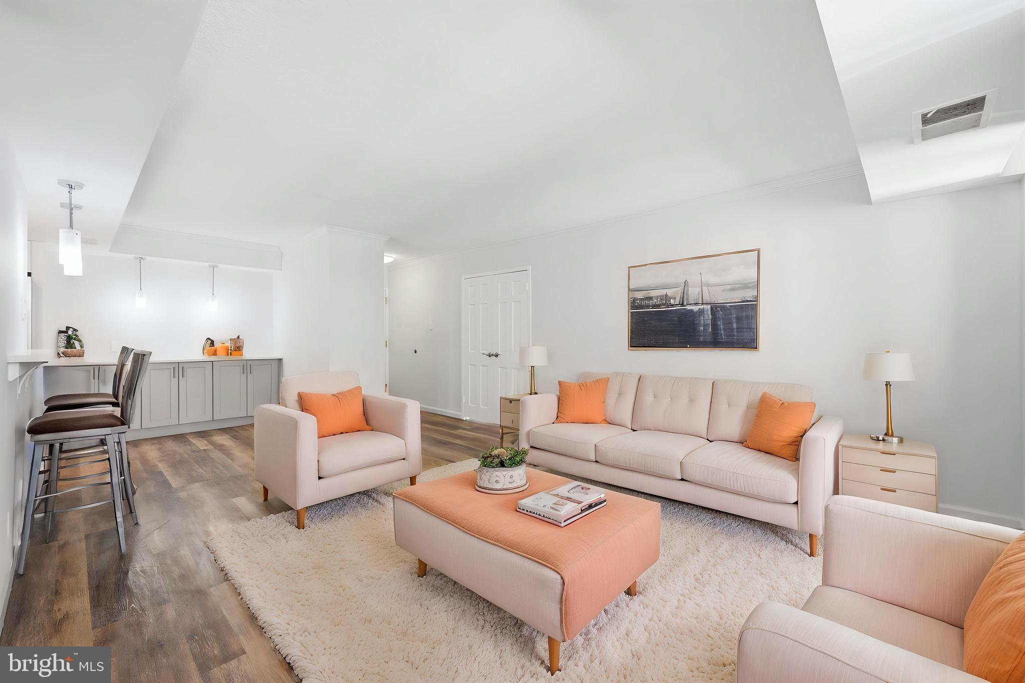 Welcome to the 11th floor, a wonderful sunlit, bright and spacious South view unit in The Elizabeth.  Renovated and cared for since; this condo is awaiting it’s next owner.  The kitchen boasts stainless steel appliances, under cabinet lighting, plenty of storage and counter top dining.  
You’ll love the versatility of the living area. The nook offers endless possibilities with so much room for activities! Use it as an office, den, library, dining room and the list goes on… 
Some unique features of this unit are that the washer and dryer are in their own closet making for a quieter living experience. The bedroom is separated by double doors closing it off as a suite complete with walk-in closet.  The extra half bath comes in handy for entertaining because with lush green aerial views how can you not?!?   Unit comes with 1 dedicated garage parking spot as well as garage guest parking.  Property is virtually staged.

The building is full service with a 24/7 concierge, indoor pool, sauna, guest parking and a fitness center. There are also several common spaces to enjoy, including indoor and outdoor lounge areas, a party room, library, and meeting room. Shoot over to D.C. or MD in minutes with a short stroll or community shuttle that runs to the Friendship Heights Metro. Also within the building is a bodega that makes a great burrito! Located just walking minutes from restaurants, shops, Whole Foods, Metro, bus stops and others along Wisconsin Avenue.