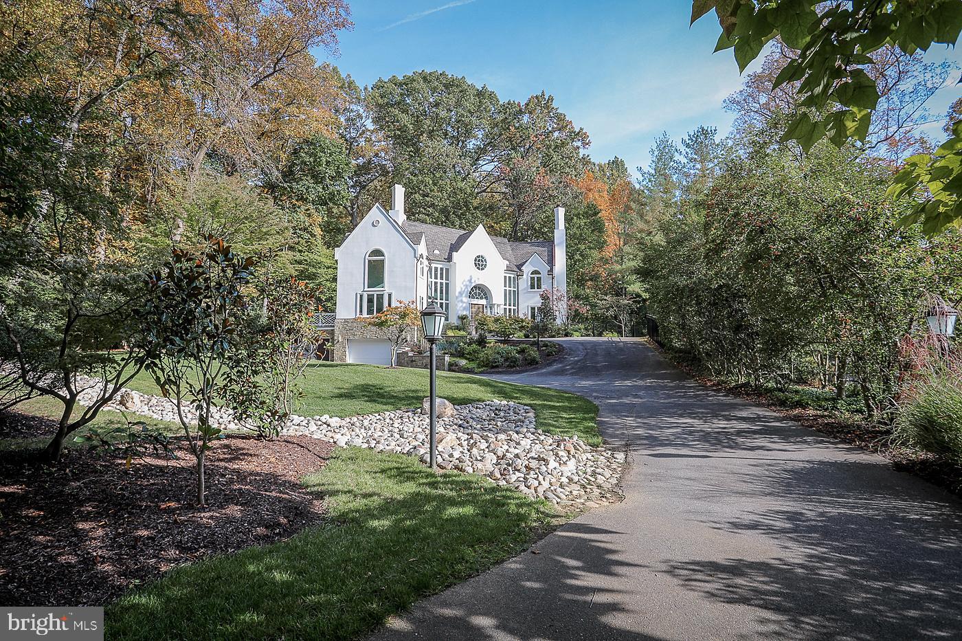 Custom designed and distinctively renovated home in Bradley Hills Grove! This breathtaking home, sited on nearly three quarters of an acre, features six bedrooms, five and one half bathrooms, an attached two-car garage and luxurious finishes throughout.  Nearly every corner of this property has been touched by the current owners, who with great pride, have selected only the finest finishes and ensured that all renovations were completed with the utmost care.  Ideally located in the highly desirable Whitman school district and just moments from downtown Bethesda. Incredible light-filled spaces, cathedral ceilings, an open, airy feel and turn-key condition are just a few ways to describe this property.  A flexible floor plan with two owner's suites, one on the main level and one on the upper level, make this a perfect home for aging in place or multi-generational living.  The gourmet chef's kitchen is a dream, outfitted with the finest materials including Wolf/Sub Zero Appliances, quartzite countertops, designer tile and Restoration Hardware lighting. PLEASE NOTE: This kitchen currently features an induction cooktop but there is a gas line already in place for easy modification to a gas cooktop if one wishes, AND there is proper kitchen exhaust venting in place (to the exterior).  Enjoy sprawling spaces whether you're in the formal living room with a 2-sided FP, or in the family room, also outfitted w/a oversized FP, or better yet, relax in the morning room, overlooking the serene yard. There's also an expansive Trex deck for outdoor entertaining, and plenty of room to add a swimming pool (design available by request).  The upper level owner's bath was just renovated and provides a spa-like experience.   There's also a newly renovated shared bath, just completed a few weeks ago! The list of renovations goes on and on.  This home also offers multiple work spaces, perfect for today's lifestyle.  The lower level has a brand new wet bar, and great recreational space. All major systems have been replaced including windows, roof, stucco, HVAC, water heater, lighting, flooring, etc.  Check out the virtual tour for additional details, and schedule your appointment to see this masterpiece in person!