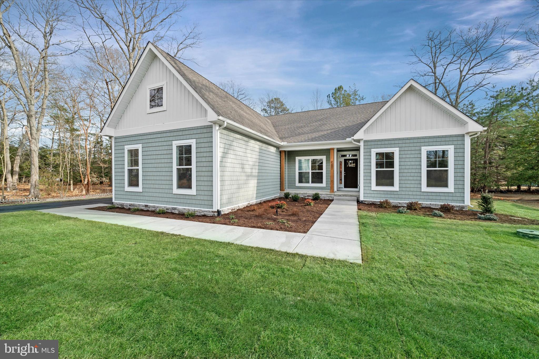 Built by award-winning local builder, Capstone Homes, this Juliet spec home on lot 17 in The Cove on Herring Creek is ready NOW with a quick delivery incentive*, plus the builder will split the transfer tax*! The Juliet is Capstone's most flexible floorplan beginning with the convenience of first floor living including the primary suite with two additional bedrooms, study, large laundry room and kitchen with dining area. Capstone Homes goes a step above the competition by offering standard what some call upgrades. In addition, this particular home has enhanced even more with, a morning room, gourmet kitchen, vaulted ceiling, screened porch, gas fireplace, luxurious primary bathroom with tiled shower and frameless glass shower door, quartz countertops, an upgraded lighting package, 3 car garage, custom trim, sod and irrigation and more! This is one of the last buildable lots in The Cove on Herring Creek. Tucked off Herring Creek, and just minutes from beach towns, this community offers quiet privacy with a gazebo, scenic pond and outdoor pool.  Founded in 2006, this family-owned and operated local builder is committed to building quality homes throughout Sussex County. Call today to request a full list of Capstone’s standard features, upgrades and floor plan, or make an appointment to visit this slice of paradise. Capstone Homes - Guiding you home, every step of the way. *Incentive is included in the list price. Incentives and pricing may change at any time. 2% transfer tax paid when using a preferred lender.