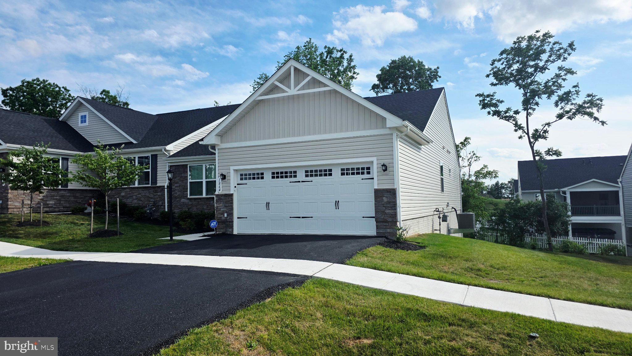 Welcome to this newly built 2025 ranch villa in the highly desirable Greencastle Greens community, offering the perfect blend of modern style, comfort, and low-maintenance living. Featuring 3 bedrooms and 3 full baths, this thoughtfully designed home boasts a bright, open-concept layout ideal for both everyday living and entertaining.
The gourmet kitchen serves as the centerpiece of the home with granite countertops, stainless steel appliances, a spacious breakfast bar island, and a dedicated dining area that flows seamlessly into the inviting living room. Step outside to the 10x14 Trex deck — the perfect spot for morning coffee, outdoor dining, or relaxing evenings.
The primary suite includes a walk-in closet and a private en suite bath with double sinks and a walk-in shower. A separate laundry room adds everyday convenience. Recessed lighting enhances the home throughout. 
The finished walk-out basement offers a generous recreation room and an additional full bath, plus a separate unfinished room ready to be customized for additional living space, a home gym, or storage. 
Enjoy easy living with HOA services that include lawn care, snow removal for streets, sidewalks, and driveways, trash service, and common area maintenance. Located adjacent to Greencastle Golf Club and just minutes from shopping, dining, healthcare, schools, and recreation, this move-in-ready home delivers the best of new construction in an established community. 
Schedule your showing today!
