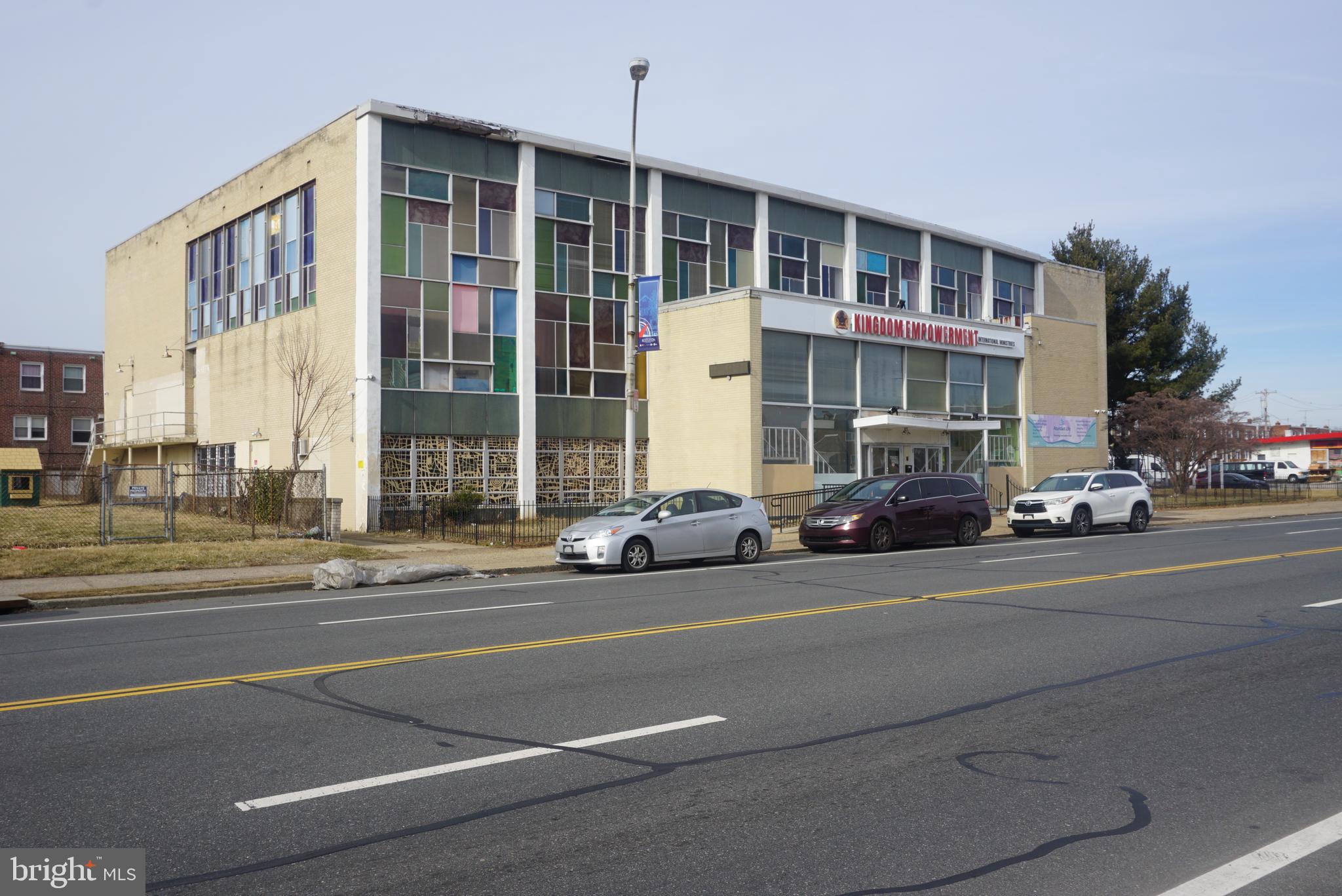 Enormous 24,000 square foot building at the corner of Bustleton and Unruh in Northeast Philadelphia.    Currently used as a Church, Nursery, and School with two floors.  It begins with an impressive two story entrance Foyer.  The first floor consists of offices, class rooms, restrooms, a kitchen,  and meeting rooms.  The second floor has two enormous rooms with 25 foot ceiling height, each with its own stage and separated by a movable wall to become one large venue. The open span construction allows for many potential fit outs and uses.  Some upgrades have been made to heat, and electric.  This building is waiting for the next business to restore this great venue.