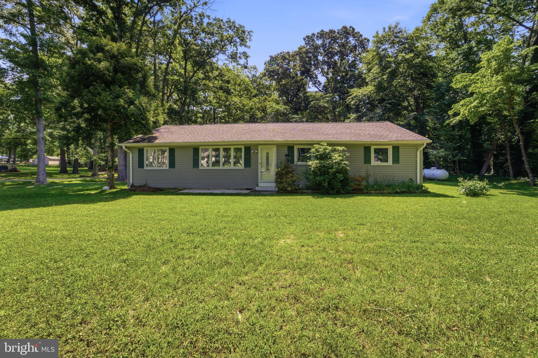 Discover the charm of this beautifully renovated home in North Town Creek , set to impress with its major renovations completed in 2026. This spacious raised ranch features 4 inviting bedrooms and 2.5 bathrooms, perfect for comfortable living. The open layout invites natural light, creating a warm and welcoming atmosphere throughout. Enjoy the convenience of an attached rear-entry garage, providing easy access and ample storage.Expansive maple cabinets in kitchen with pull-out shelves, U-shaped granite counter with eat-at space. Dining room looks out onto a sunny weather-resistant deck overlooking a gardening area.  Propane on-demand water heater, full-house back-up generator, water softener.  Two-car garage. Pellet stove for cold winter days.  All rooms except living room have ceiling fans.  Living room has tasteful crown molding and casement windows. The expansive 0.55-acre lot offers plenty of outdoor space for relaxation or entertaining, while the durable vinyl siding ensures low maintenance for years to come. With a focus on modern living, this home is designed to meet your needs, blending style and functionality seamlessly. Whether you're hosting gatherings or enjoying quiet evenings, this residence is a true sanctuary. Experience the perfect blend of comfort and contemporary design in a community that feels like home. Don't miss the opportunity to make this your own!