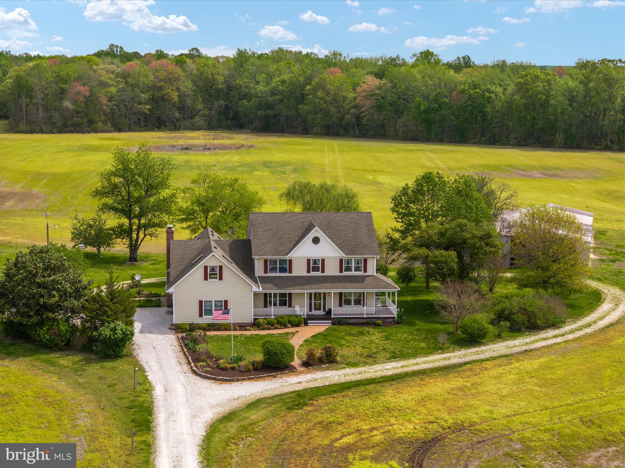 Back on the Market due to Buyer's FSA financing falling through. 

SELLER NOW OFFERING A $20,000 CREDIT TOWARDS FRESH PAINT & NEW CARPET! Welcome to Thanksgiving Farm, an exceptional opportunity to own nearly 100 acres of prime Eastern Shore farmland just minutes from charming small towns and within easy reach of Ocean City, Annapolis, and major airports. This versatile estate includes two parcels – one is a separate, buildable 13.81-acre lot, offering future flexibility or potential multi-generational living. Tucked at the end of a long private drive, the main home is a thoughtfully designed farmhouse that perfectly blends classic charm and practical living. The home features four spacious bedrooms upstairs, including a private primary suite with a sitting area, large bathroom, and direct access to a massive bonus room – perfect for a home office, yoga studio, sewing room, or playroom. The bonus room also has its own private staircase, making it a truly flexible space. On the main level, enjoy hardwood floors throughout, a light-filled kitchen that opens to a casual dining area and cozy family room with a wood stove. Just off the family room, a large screened-in porch overlooks the property’s picturesque fields, gardens, mature trees, and classic barn. A formal living room and dining room round out the main level, ideal for gatherings and entertaining. There’s also a convenient first-floor bedroom. The unfinished attic—with walk-up stairs, windows, and skylights—offers the potential for a bunk room, office, or gym, while the walk-out basement is ideal for a workshop or storage and connects directly to the attached garage. Outdoors, the land itself is the true star. Of the 99.81± total acres, approximately 70 are tillable—ideal for row crops or converting to a regenerative farm. Several low-lying areas create opportunities for duck ponds or managed impoundments. The remainder of the property is wooded and absolutely teeming with wildlife—whitetail deer, turkey, and more—making it a hunter’s paradise. A large equipment shed offers ample space for tractors, ATVs, RVs, boats, and anything else you can imagine. Whether you’re looking to work the land, create a multigenerational retreat, or simply unwind in the heart of Maryland’s farm country, Thanksgiving Farm offers endless possibilities.