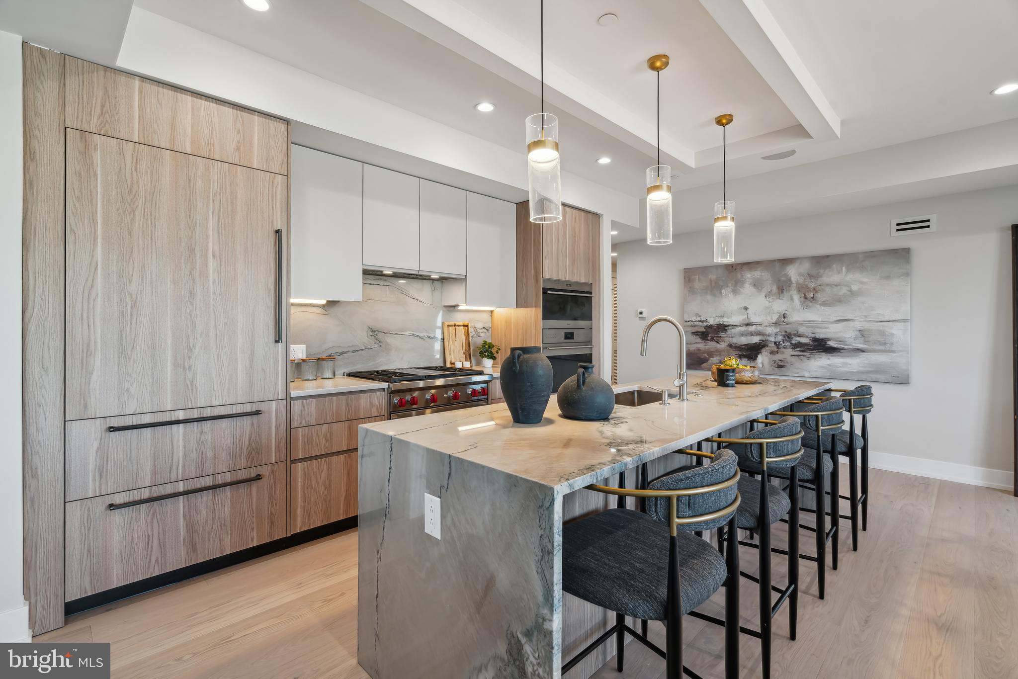 Introducing: The Ben! This upscale boutique residential building is located in the heart of Philadelphia’s Old City neighborhood and was inspired by the history and charm of the surrounding core. Juliet balconies, roof decks, and a private contemporary gym with custom-branded weights are just a few items that put the Ben residences in a class of their own. Penthouse units and various floor plans are available. Residence 501 is an incredible bi-level home. The private elevator opens directly into your home. The first level is perfect for entertaining with an incredible designer kitchen and a private terrace off of the dining area. The massive windows across this corner building will allow immense lighting throughout. The kitchen features WOLF and Subzero appliances, and beautiful European Porcelanosa cabinetry providing an abundance of storage. The bedroom level has three large bedrooms and designer porcelain tile bathrooms. The primary bedroom is washed with natural light through the massive wall of windows. The built-in closet system and luxurious primary bathroom with a steam shower finish the space. There are no upgrades necessary in this home as this is an all-in home! Every residential unit at The Ben is designed with “Luxury Living” in mind. From the uniquely curated views of the Delaware Waterfront and Center City, Amazon package locker, and glamorous lobby to the top-of-the-line finishes throughout, every detail was carefully selected to create a lifestyle as unique as The Ben’s location. Taxes are not $1 - Taxes and square footage are the responsibility of the buyer to have verified. **Photos are for marketing purposes only. The light kitchen photos are from Unit 601. There are light and dark scheme kitchens available both in our bi-level units and our Penthouse & Junior Penthouses flats. There is a 10-year tax abatement. The PAR Standard Agreement of Sale for New Construction of sale must be used for new construction properties whether completed or not.