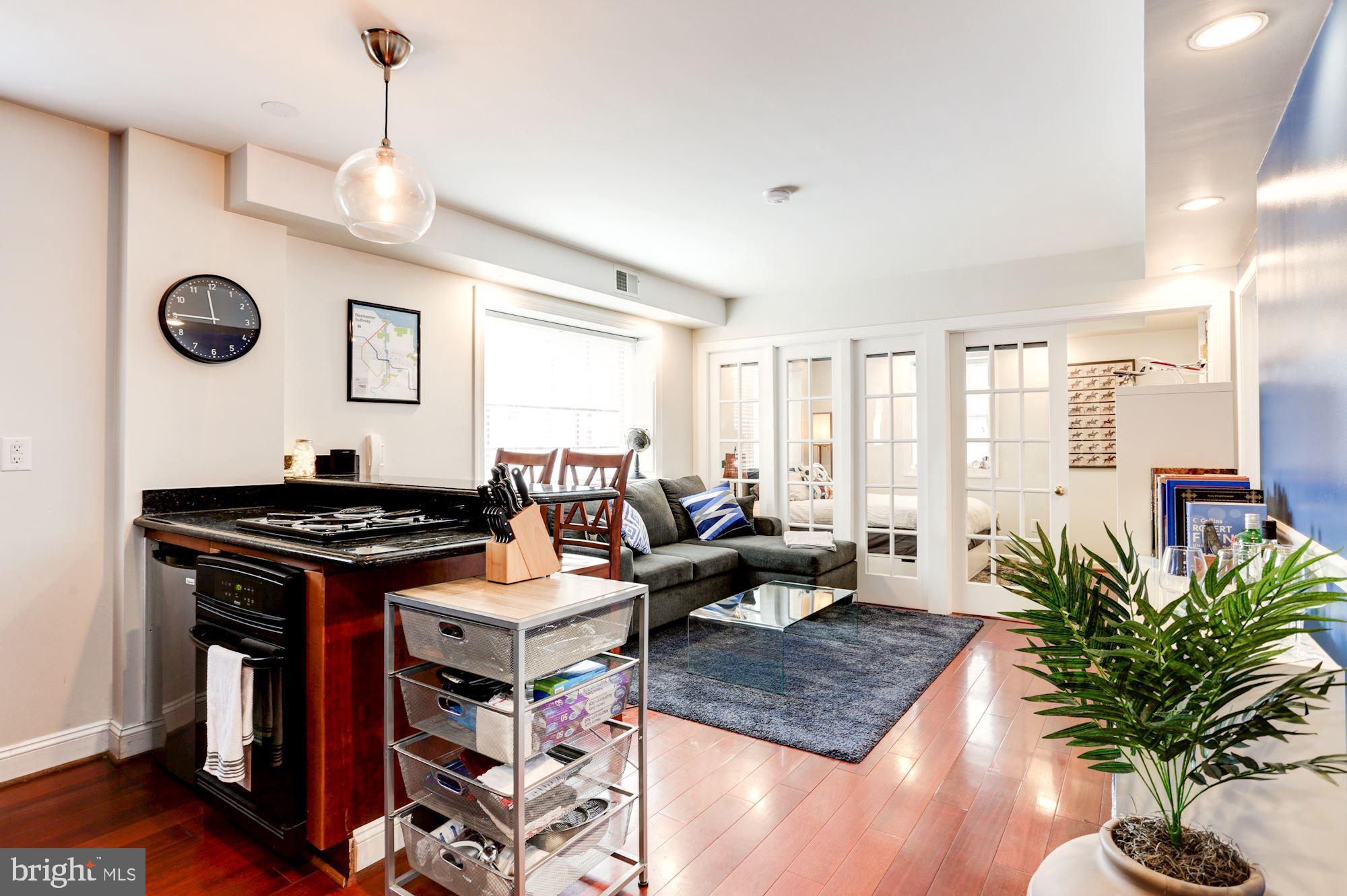 Welcome to this beautifully upgraded 1-bedroom, 1-bath residence in the heart of Logan Circle, boasting an exceptional 98 Walk Score and unbeatable access to everything DC has to offer. Step inside to find gleaming wood floors throughout and an abundance of natural light that fills the space. The updated kitchen features granite countertops, modern finishes, and ample cabinet space—perfect for both everyday living and entertaining. The bathroom is tastefully renovated with ceramic tile, offering a clean and contemporary feel. Enjoy the convenience of an in-unit washer and dryer, along with the added value of all utilities included in the condo fee. Brand new HVAC and Washer/Dryer! Located just steps from the vibrant 7th Street/Shaw corridor, the renowned 14th Street dining and shopping scene, and Downtown DC, you’ll be immersed in some of the city’s best restaurants, nightlife, and cultural attractions. Commuting is a breeze with Metro access just two blocks away. Whether you’re a first-time buyer, investor, or looking for the perfect city pied-à-terre, this home checks all the boxes.