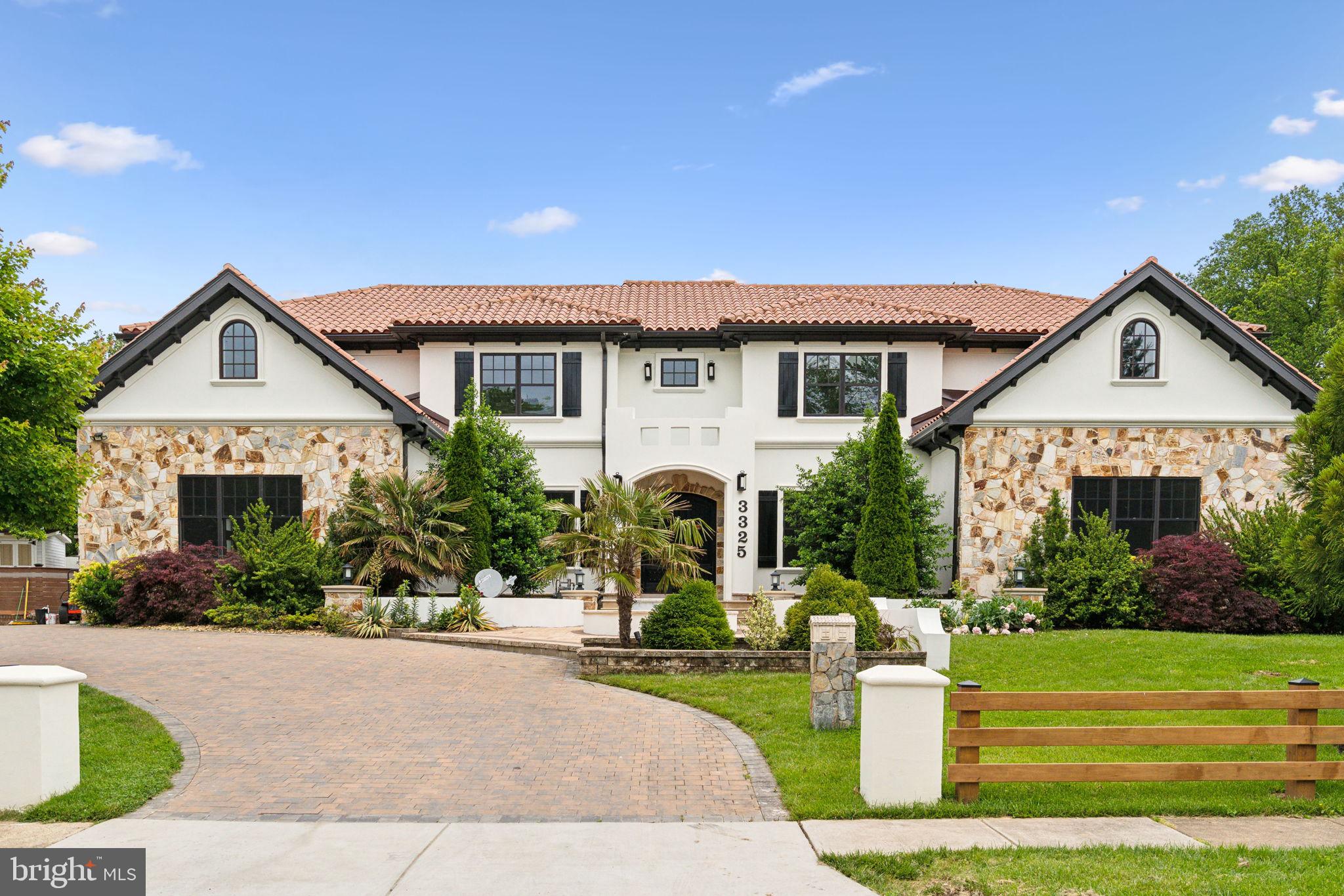 Welcome to this  like new  custom home on a large lot,  built by a local custom builder,  as his own residence   in 2017 with exceptional quality and materials.  Welcome to this like-new custom Mediterranean-style home, originally built in 2017 by Merit Homes as the builder’s personal residence and recently updated with fresh paint, new bathroom cabinets, lighting, and countertops to give it a refreshed, modern feel. Set on a large lot, this thoughtfully designed home features a clay tile roof, stucco exterior with stone accents, 6 bedrooms, 5 full and 1 half bathrooms, 2 fireplaces, 2 offices, and a 3-car heated garage. Expansive wraparound balconies on the main and upper levels are crafted with weather-resistant Tiger wood panels, glass railings, ceiling fans, and durable Epay wood flooring known for its 75+ year lifespan. The backyard is a private retreat with a heated pool and cascading waterfall, jacuzzi, pool house, outdoor shower, built-in kitchen, stone patio, and automatic sprinkler system. Inside, the main level offers a marble-floored foyer, formal dining room, living room with built-ins, a guest bedroom suite, an office, and a family room with cathedral ceiling and fireplace, seamlessly flowing into a gourmet kitchen with Wolf/Sub-Zero appliances, new quartz countertops, and an oversized island. Upstairs, the spacious primary suite includes two walk-in closets, a sitting area with fireplace, a large covered balcony, and a luxurious bath with a steam shower, jacuzzi tub, and heated floors. The home includes two laundry rooms—one fully equipped on the upper level and another on the lower level (washer/dryer on lower level not included). The finished lower level also features a bedroom with full bath, office with built-ins, and a recreation room with wet bar, offering comfort, style, and functionality throughout this exceptional residence.