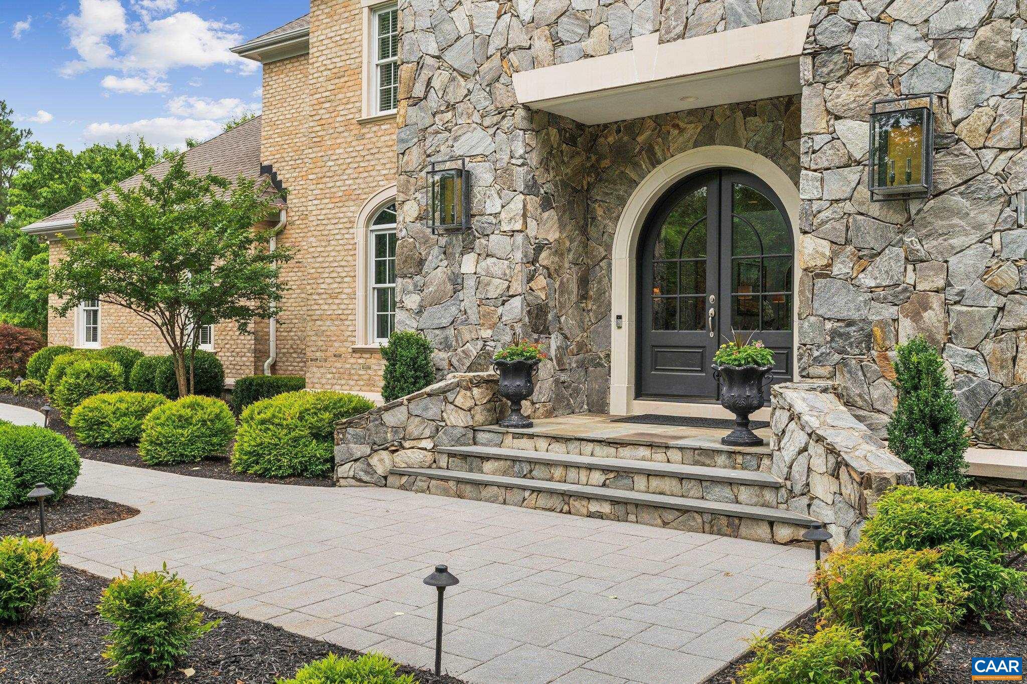 Extraordinary six bedroom architecturally designed Glenmore residence on just over one private acre. It is no doubt one of the most beautiful homes in Glenmore! The luxurious grounds feature a resort style pool with a lavish patio surround, creating a harmonious blend of indoor and outdoor luxury. Property is exquisitely landscaped & fenced with total privacy from all sides. Premium quality build- 2 x 6 framing, all brick & natural stone exterior & remarkable attention to detail throughout. Dream Kitchen w/designer appliances impressive granite island, 3-car garage wired for electric vehicle, home theater, wine cellar, generator, lawn irrigation and so much more. New 2023 Primary Bath remodel. Nearly 6,495 finished sq. ft. above grade with 2,715 on the spectacular walkout Terrace level. There, you will enjoy the well appointed granite bar & wine cellar, expansive family room, 2nd Primary suite, home theater, exercise room, and seamless access to the luxurious back yard pool and grounds. This sought after living space provides convenience, comfort and a touch of luxury where you will spend endless hours of enjoyment. All rooms/bedrooms/wardrobes are spacious very generous.,Cherry Cabinets,Glass Front Cabinets,Granite Counter,Fireplace in Family Room