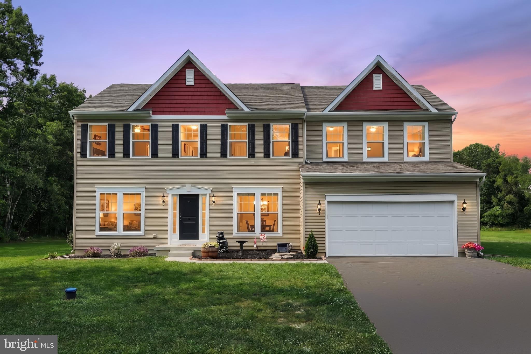 Nestled on 2.29 peaceful acres in a scenic rural setting, this stunning two-year-old Colonial offers the perfect blend of modern comfort and timeless style. Featuring 4 bedrooms and 3.5 baths, this move-in-ready home boasts 9-foot ceilings throughout the first floor, a home office, and a beautifully appointed kitchen with granite countertops and a large breakfast room filled with natural light. The finished lower level includes a spacious rec room, wet bar, and full bath, providing excellent space for entertaining or guests. An oversized two-car garage offers additional storage and convenience. Enjoy the privacy of country living in a like-new home with room to relax, work, and entertain.