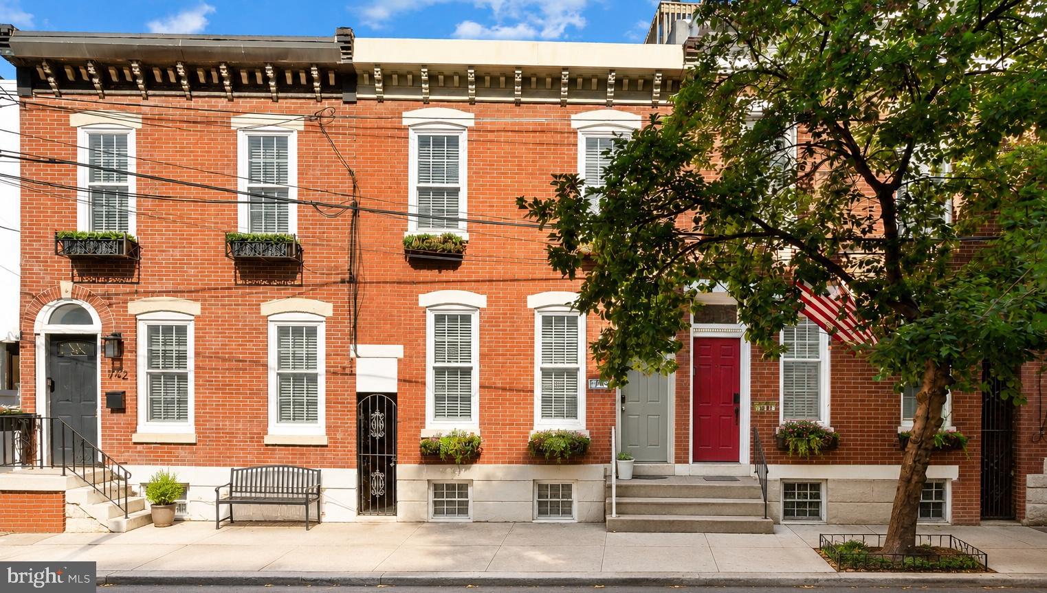 Classic Fairmount charm, incredible width, and an unbeatable location come together in this beautiful 16-foot-wide brick-front townhouse. Homes this wide are a rare find in the neighborhood, offering a noticeably more spacious feel throughout, and the lot is an impressive 62 feet deep.
The handsome brick façade welcomes you into a home filled with character, including refinished random-width hardwood floors, crown moldings, and a beautiful brick fireplace. The open living and dining area flows into an updated kitchen with stainless steel appliances and access to a private rear patio.

Upstairs, two skylights fill the home with natural light. The spacious bedrooms offer great flexibility, and the primary bedroom easily accommodates a king-sized bed
The finished lower level provides great bonus space for a den, office, gym, or guests, along with a powder room, laundry, and storage.
Perfectly located on one of Fairmount's most desirable blocks, just steps from neighborhood favorites, museums, Kelly Drive, Fairmount Park, and Center City. A lucky buyer will get a true Fairmount gem and enjoy everything this wonderful neighborhood has to offer.