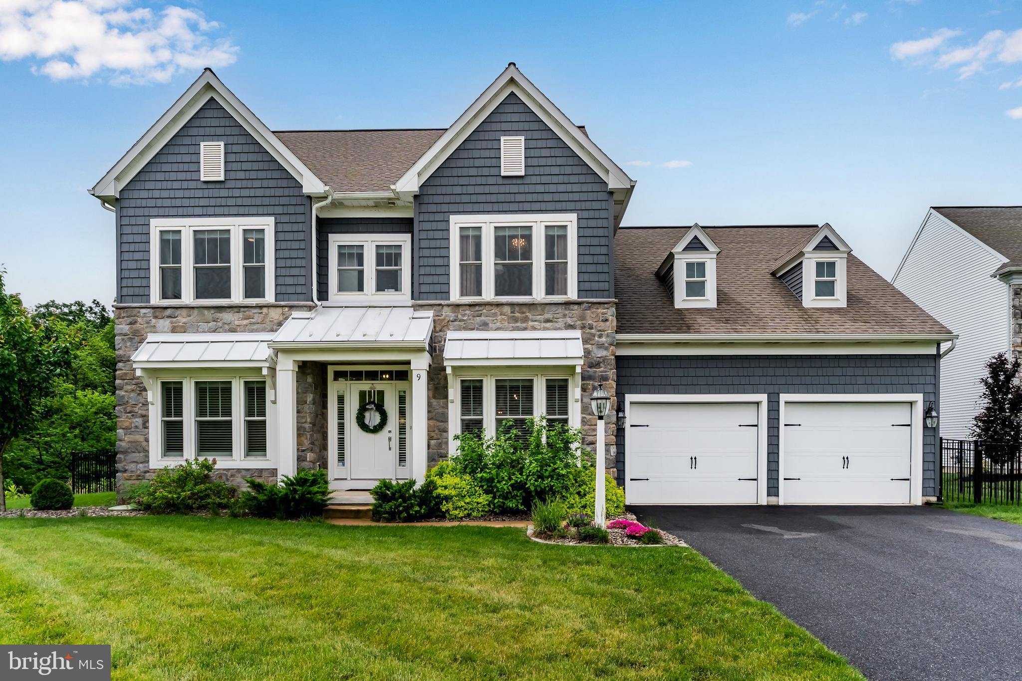 Welcome to this beautifully upgraded Garman-built home in the desirable Peninsula community of Silver Spring Township, located within the Cumberland Valley School District. Built in 2021, this impressive 4-bedroom, 3.5-bath home offers over 4,000 square feet of finished living space, including a professionally finished lower level completed in 2022 adding approximately 925 additional square feet. The thoughtfully designed floor plan features a private home office, formal dining room, and an open-concept kitchen with quartz countertops, white cabinetry, stainless appliances, double ovens, and an oversized island. The luxurious owner’s suite offers tray ceilings, custom California Closets, and a beautifully updated en-suite bath featuring a newly retiled shower completed in 2025. Outside, enjoy the stunning expanded patio with seating and fenced backyard — ideal for entertaining, relaxing, or pets. Additional high-end upgrades include a Kinetico whole-house water conditioning system with reverse osmosis drinking system, radon mitigation system, ADT security system, custom window well installation, Bosch dishwasher, and multiple custom closet systems throughout the home.
With a 4-car tandem garage, modern finishes, exceptional storage, and extensive post-construction improvements already completed for the next owner, this move-in ready home combines luxury, functionality, and peace of mind in one of Mechanicsburg’s premier neighborhoods.