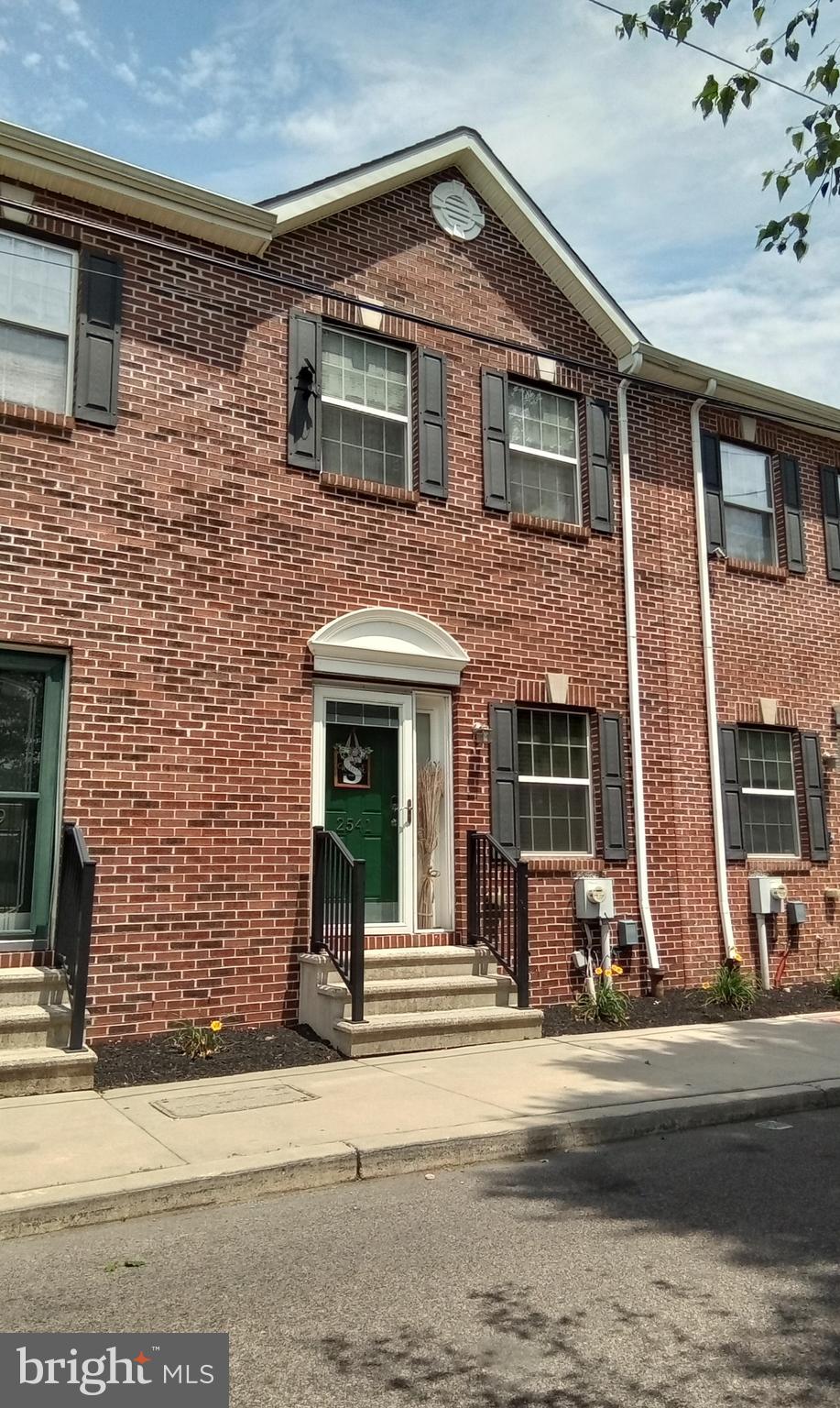 You'll Love This Charming, 2-Story Brick Straight-through Home, Beautifully Updated and in Move-In Condition. Located in the Historic Port Richmond Section of Philadelphia within the Highly Desirable Prive Gated Development of Kingston Square. Built in 2009 this 3 Bedroom, 2.5 Bath Home Has So Much to Offer!!! This Property Offers Over 1,900 sqft with 3 Floors of Living Space that includes the Fully Finished Basement. Enter the Main-Level and Notice the Open Floor Layout featuring a Spacious Living Room filled with Natural Light that Boasts Hardwood Floors flowing into the Formal Dining Area. Make your way into the Stylish Kitchen to find Custom Cherry-wood Cabinets, Granite Counter Tops w/Island, Stainless Steel Appliances, a Tiled Backsplash and Pantry for additional storage. The Upper Level Contains 3 Bedrooms with Ample Closets, a Laundry Room, Recently Remodeled Hall & En-Suite Bathrooms that include Marble Tile and Modern Finishes. The Lower-Level is a Fully Finished Recreation Room for Additional Living Space with Laminate Wood Floors, Large Storage Closets and includes a separate area used as an Office. This Home Offers a rear parking space within the gated lot, a Finished Attic for all your storage needs and so Much More. Conveniently Located close to all Major Highways, Shopping, Schools, and Recreation Areas. Don’t Miss this Truly Great Home! Schedule Your Showing Today!