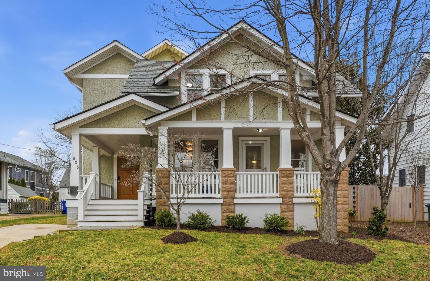 UNDER CONTRACT ALL OPEN HOUSES CANCELLED -Tucked away on a quiet street in Arlington’s desirable Lyon Village neighborhood, this classic bungalow blends timeless charm with thoughtful contemporary updates and cutting edge energy efficiency. A welcoming wraparound front porch sets the tone for this inviting home. >> The open concept main level is designed for everyday living and entertaining, featuring custom solid maple hardwood floors and a beautifully appointed kitchen with solid teak cabinetry, gas cooking, and a farmhouse sink. The main living area includes a cozy window seat and custom built-ins for added warmth, character, and storage. Elegant mahogany French doors bring in natural light and connect the living spaces to the outdoors, opening to a spacious wood deck that extends the living area and overlooks a private, fully fenced backyard. A cozy sitting room with a fireplace opens to the front porch. >> Upstairs, an expansive primary ensuite offers cathedral ceilings, a spacious walk-in closet, charming Juliet balconies, and a spa inspired bath with dual vanities, a frameless glass shower, and a freestanding soaking tub. Two additional bedrooms share a hall bathroom, and a versatile fourth room provides flexibility for a private office or nursery. >> The lower level includes a large recreation room, an in-law suite with full bath and kitchen, and an oversized laundry area, making these spaces both functional and comfortable. Dual staircases provide convenient access from both the living room and kitchen. >> Outdoors, the fully fenced backyard creates a private setting for relaxing or play, and the extended driveway offers parking for multiple vehicles. The home is powered by a high performance geothermal heating and cooling system supported by three deep wells, delivering clean, quiet operation while reducing energy costs by approximately 50%. >> Just blocks from the vibrant heart of Clarendon — with shops, dining, and Metro access — this exceptional home combines timeless design, modern efficiency, and an unbeatable location.