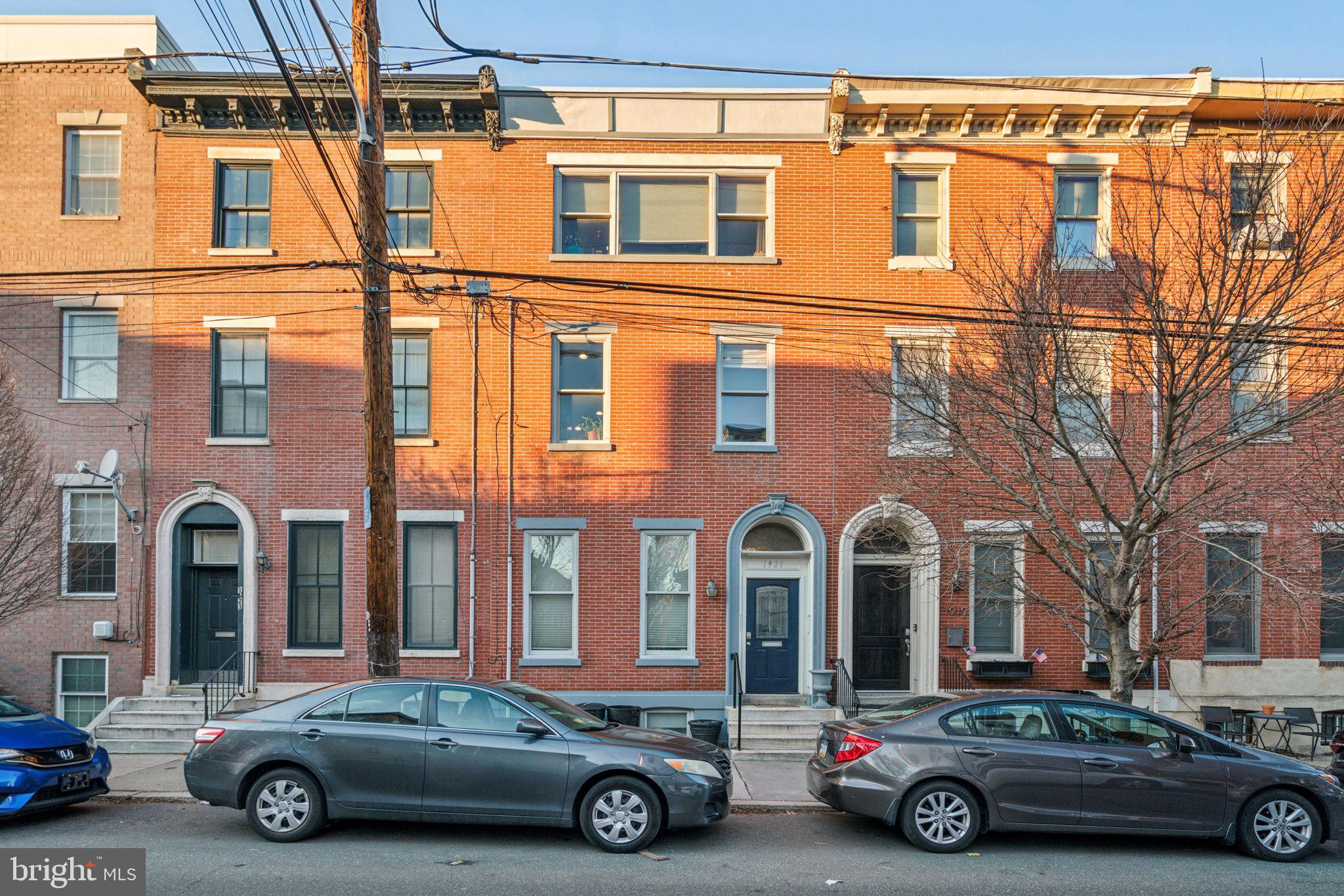 Stately brick front Victorian townhouse completely renovated as a Duplex, two unit home in the heart of the vibrant Francisville neighborhood.  Consisting of a 2BR, 2ba bi-level unit on the lower two floors and a 3BR, 2 1/2ba bi-level unit on the upper two floors.  The ideal property for an investor to make strong rental income in a bustling neighborhood or an owner-occupant looking to live in one unit and earn rental income from the other! This beautiful property, fully renovated with modern finishes offers the perfect blend of comfortable living and investment potential. From a small shared vestibule, enter the first-floor unit featuring high ceilings, tall windows with south facing sunshine, hardwood floors, and recessed lighting throughout. The spacious open plan living and dining room leads into a sleek kitchen with granite countertops, stainless appliances, and a breakfast bar. A door next to the kitchen offers access to the generously sized patio, perfect for outdoor gatherings, container gardening and can be used as off-street PARKING! The main bedroom and bath are just beyond the kitchen. This unit also includes in-unit stackable laundry. Downstairs, the finished basement makes for the perfect lounge and entertainment space, and has a privacy door so it can be used as the second bedroom, with access to a full bathroom and additional storage. The larger, second-floor unit is a 3-bedroom, 2.5-bathroom bi-level apartment with hardwood floors, central air, and a private back deck off of the kitchen which overlooks the back yard. The open kitchen includes stainless steel appliances, a gas range, and a pantry, leads up a few steps into a spacious, open living and dining area perfect for entertaining. Upstairs, the primary bedroom boasts three oversized south facing windows and a lux en-suite bathroom, while the two additional bedrooms share a full bath off of the hall. The entire building comes with 1-car PARKING, adding extra value to this already exceptional property. Located just blocks from Fairmount Ave, local shops, restaurants, and attractions like the Art Museum district, Eastern State Penitentiary, access to the Center City business corridor and all that an urban lifestyle has to offer. This duplex offers a fantastic opportunity for investors or owner-occupants looking for rental income in a vibrant, high-demand area, come see it today!