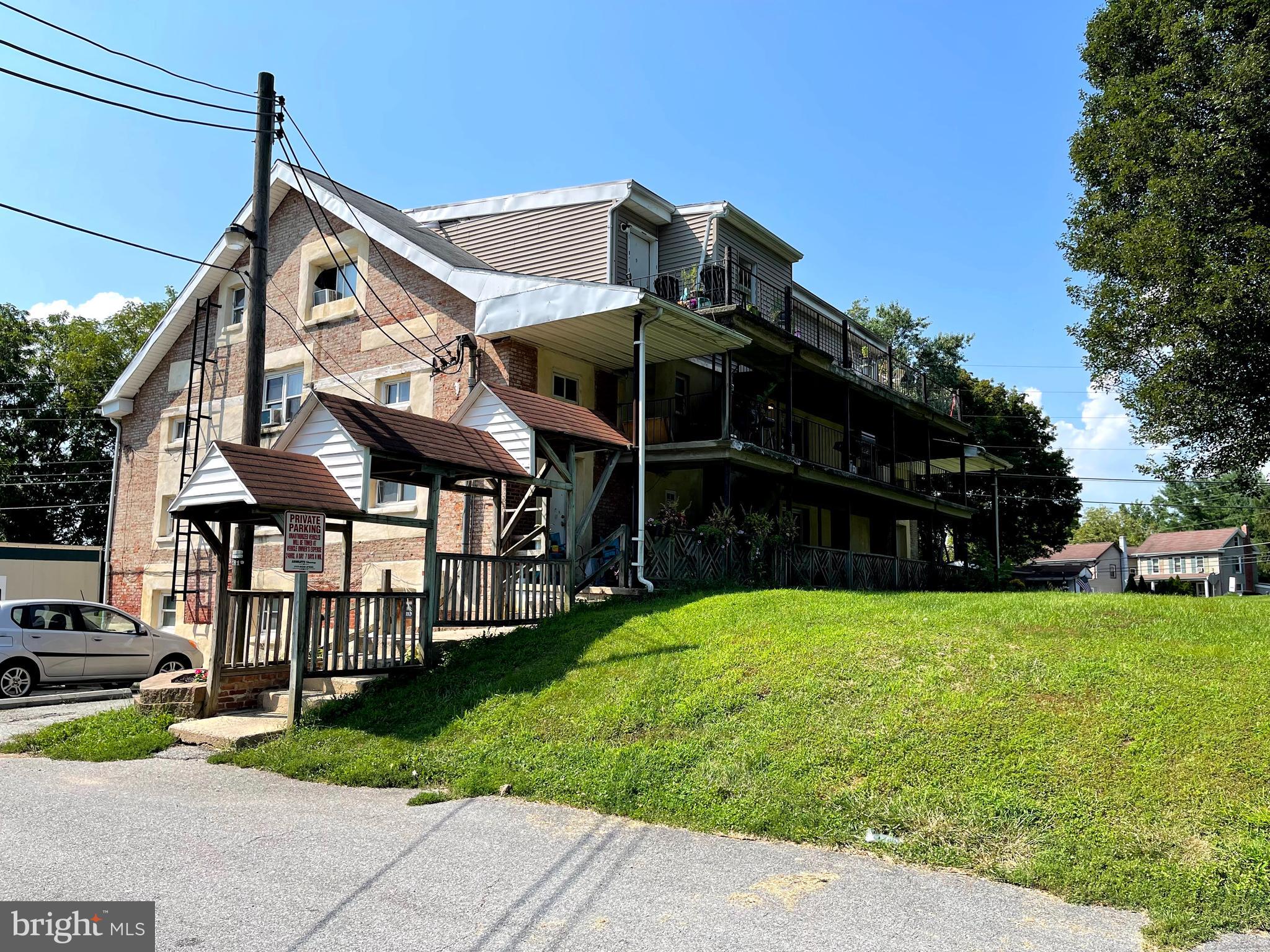 This Class B/C sale consists of a large 12-unit apartment building conversion (Old Schoolhouse) and a mobile home - Total of 13 units - Main roof is rubber/shingle - Large paved parking lot - 3 septic systems on-site - 2 wells on site - Dumpster space for trash and recycling - Country location - Most units have been recently renovated - Many long term tenants -