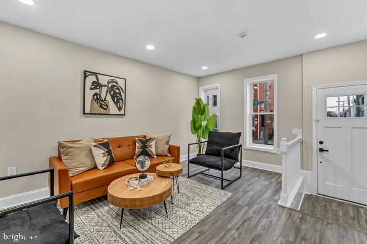 Welcome to 14 N Gilmor—where charm meets all things new! This fully renovated 4 bed, 3.5 bath beauty is giving space in all the right places. Whether you're hosting game night in the oversized living room, chilling in the finished basement, or grilling out on your private fenced-in patio, there’s room to make this one feel like home.

Located in the heart of Hollins, you’re steps away from fresh energy—new restaurants, cafes, and a neighborhood that’s growing and glowing. First-time buyer? Programs like Live Near Your Work,Buy Back the Block,  Project Reinvest , Baltimore City Employee Homeownership Program  could make owning this gem even sweeter.

Don't miss your chance to buy into a vibe and a community on the rise!
