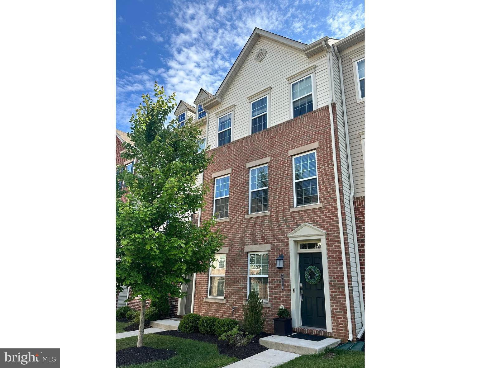 ***OPEN HOUSE***Sat, Jun 20 11:00 AM - 12:30 PM**Welcome to this exceptional three-bedroom, four-bath townhome in the highly sought-after Strawbridge Commons community. Perfectly positioned on a premium homesite, this beautifully maintained residence offers rare privacy, expansive views, and breathtaking sunset vistas with no townhomes directly behind. Enjoy peaceful outdoor living from the private rear deck overlooking mature trees and open green space, creating a serene setting rarely found in townhome communities. Designed for both comfortable everyday living and effortless entertaining, the open-concept floor plan showcases a gourmet kitchen featuring granite countertops, 42-inch white cabinetry, abundant storage, and generous prep space. Elegant, engineered wide plank flooring enhances the main living areas, while brand-new carpeting and high-end finishes throughout create a fresh, move-in-ready feel. The striking three-quarter brick front adds timeless curb appeal, while the finished lower level, complete with a powder room, offers flexible living space ideal for a recreation room, home office, fitness area, or additional living and entertaining space. Additional highlights include energy-efficient gas utilities, a spacious two-car garage, and a premier location on the community's main courtyard. Residents enjoy easy access to parks, walking trails, shopping, dining, and major commuter routes. Combining luxury finishes, exceptional privacy, scenic views, and one of the most desirable settings in Strawbridge Commons, this move-in-ready home offers a rare opportunity to enjoy low-maintenance living without compromising on space, style, or location.