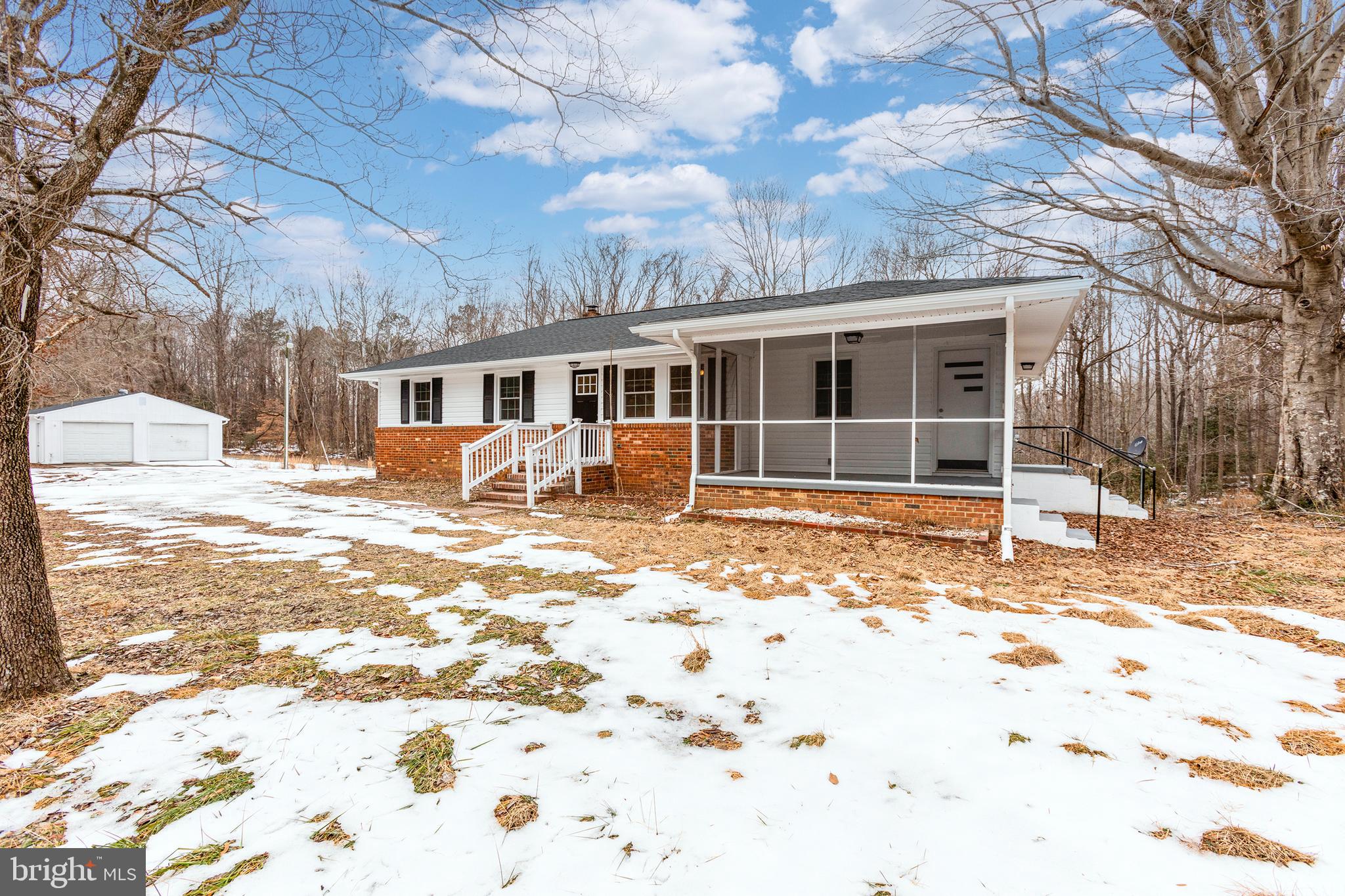 NICELY UPDATED!!- Three bedroom and three bath home in a country setting. So close to downtown Fredericksburg or 301 Highway, schools, shopping, entertainment, medical. Recent improvements include a new roof,  kitchen cabinets, countertops, appliances and baths as well as flooring and FRESH PAINT.  Sure to be a favorite is the large detached garage -  gives you plenty of room for storage or a work shop.