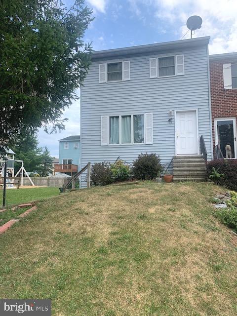 This is truly not one to pass by.   Living room, dining area and kitchen with appliances. End unit with side load garage.  Level basement walk out with sliding glass doors.  Upgrades include newer lighting, rear slider and driveway.