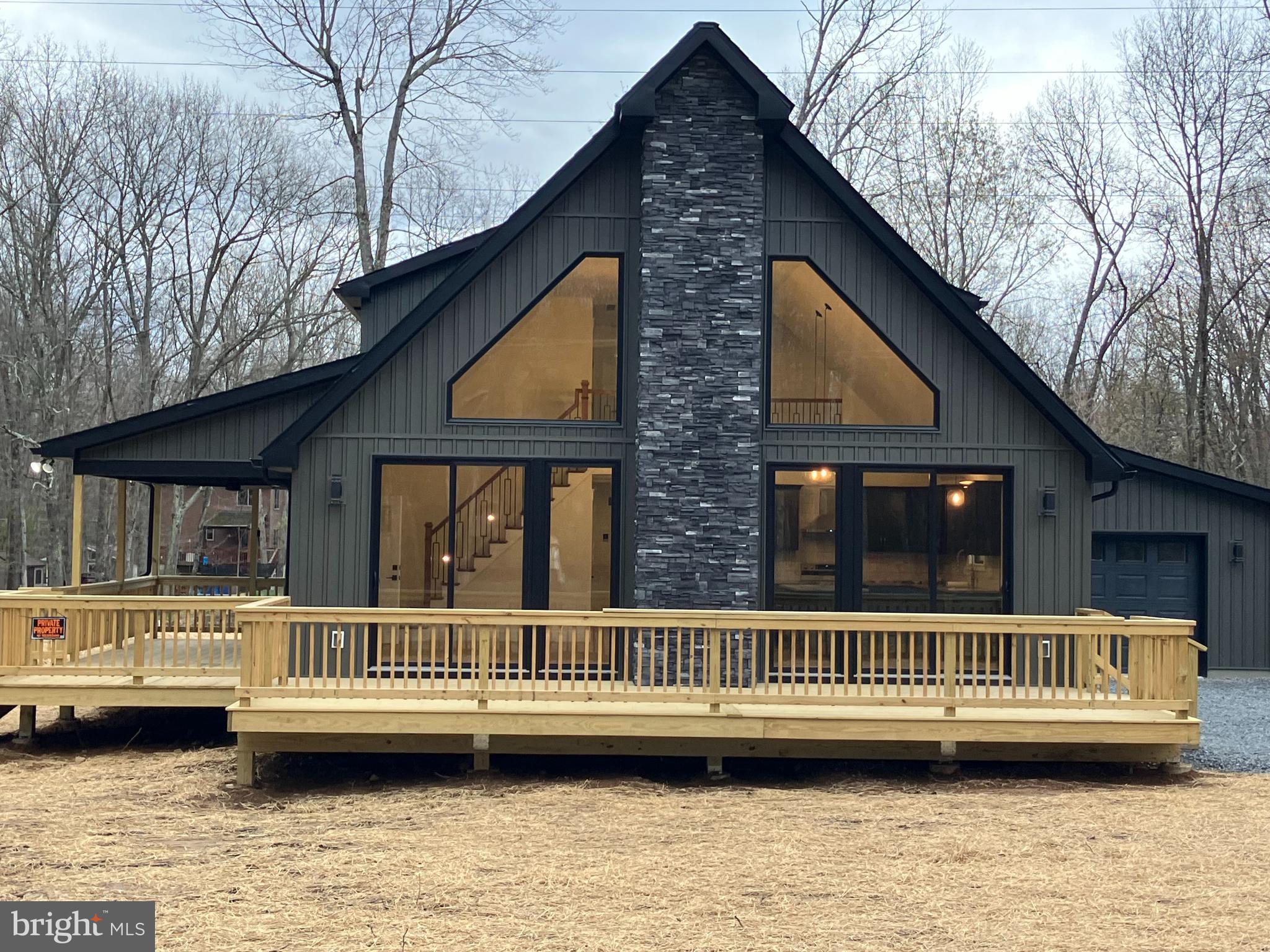 Construction to begin shortly with target completion date of October, 2026. Ultra ,odern and spacious chalet in much-sought-after Towamensing Trails with 190-acre lake, pool, clubhouse, restaurant, cocktail lounge, boat dock. Ever wanted a new STR investment property? Model can be seen at 44 Kipling Lane. Still time to choose your own colors on this one.